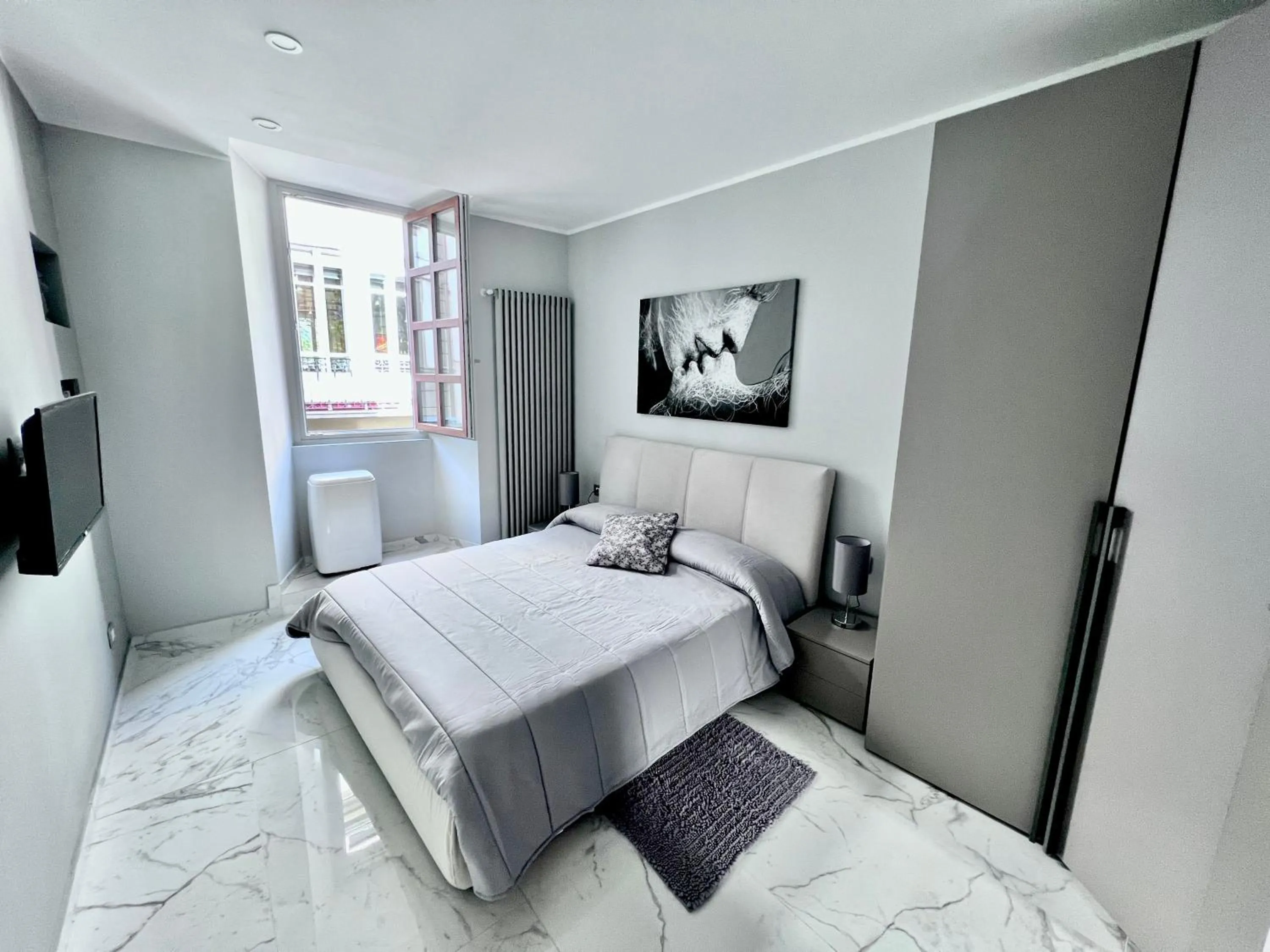 Bed in Le Porte luxury apartment