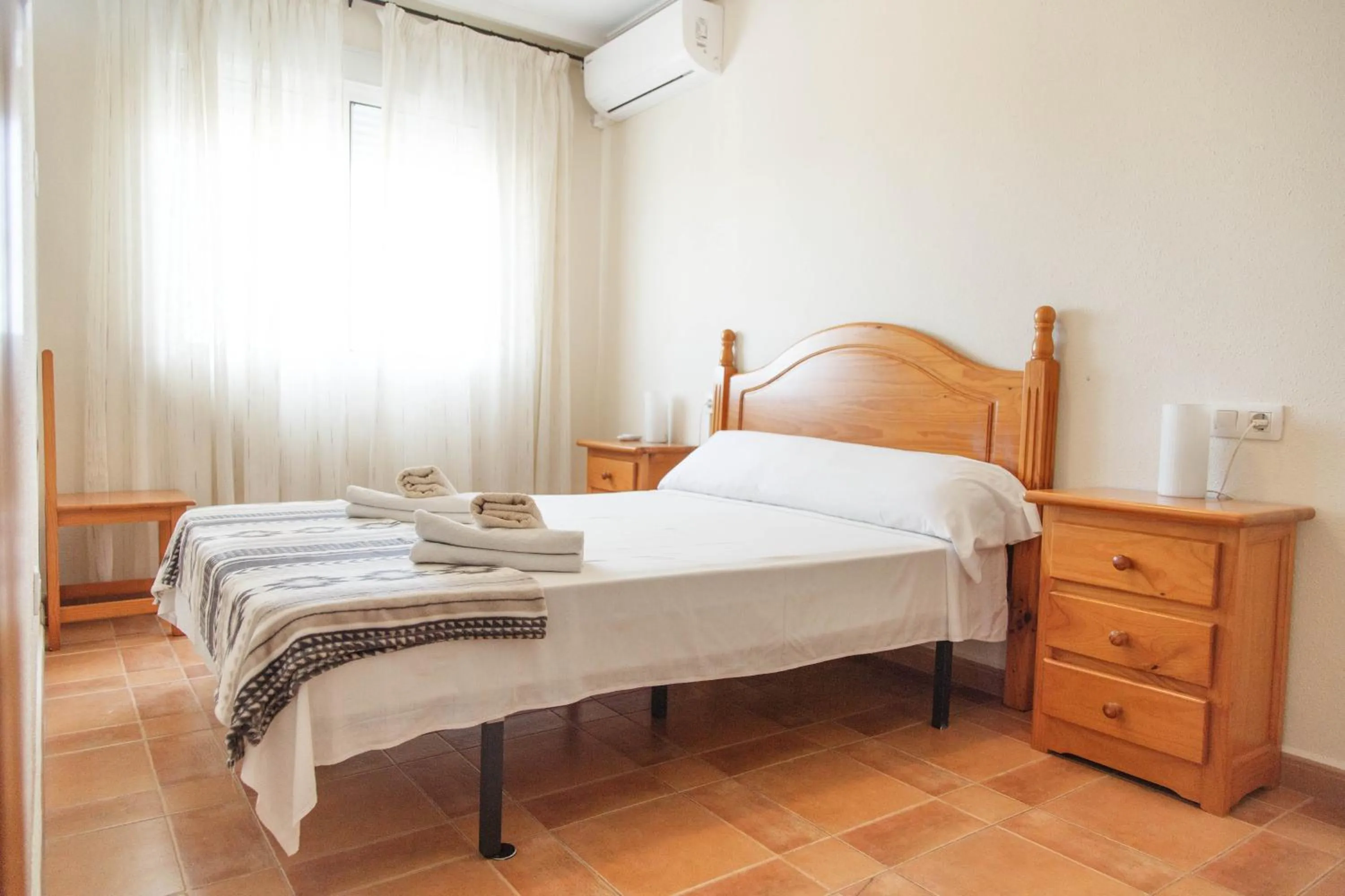 Bed in Laguna Salada Hotel Apartamento