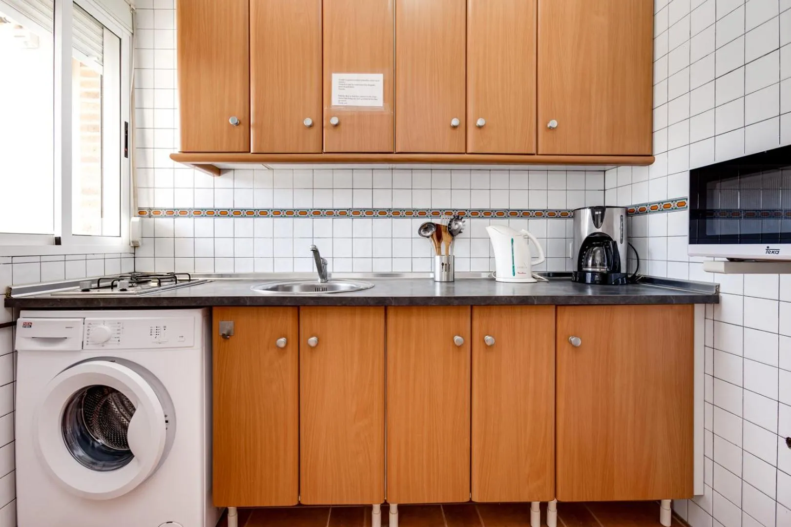 Kitchen or kitchenette in Laguna Salada Hotel Apartamento