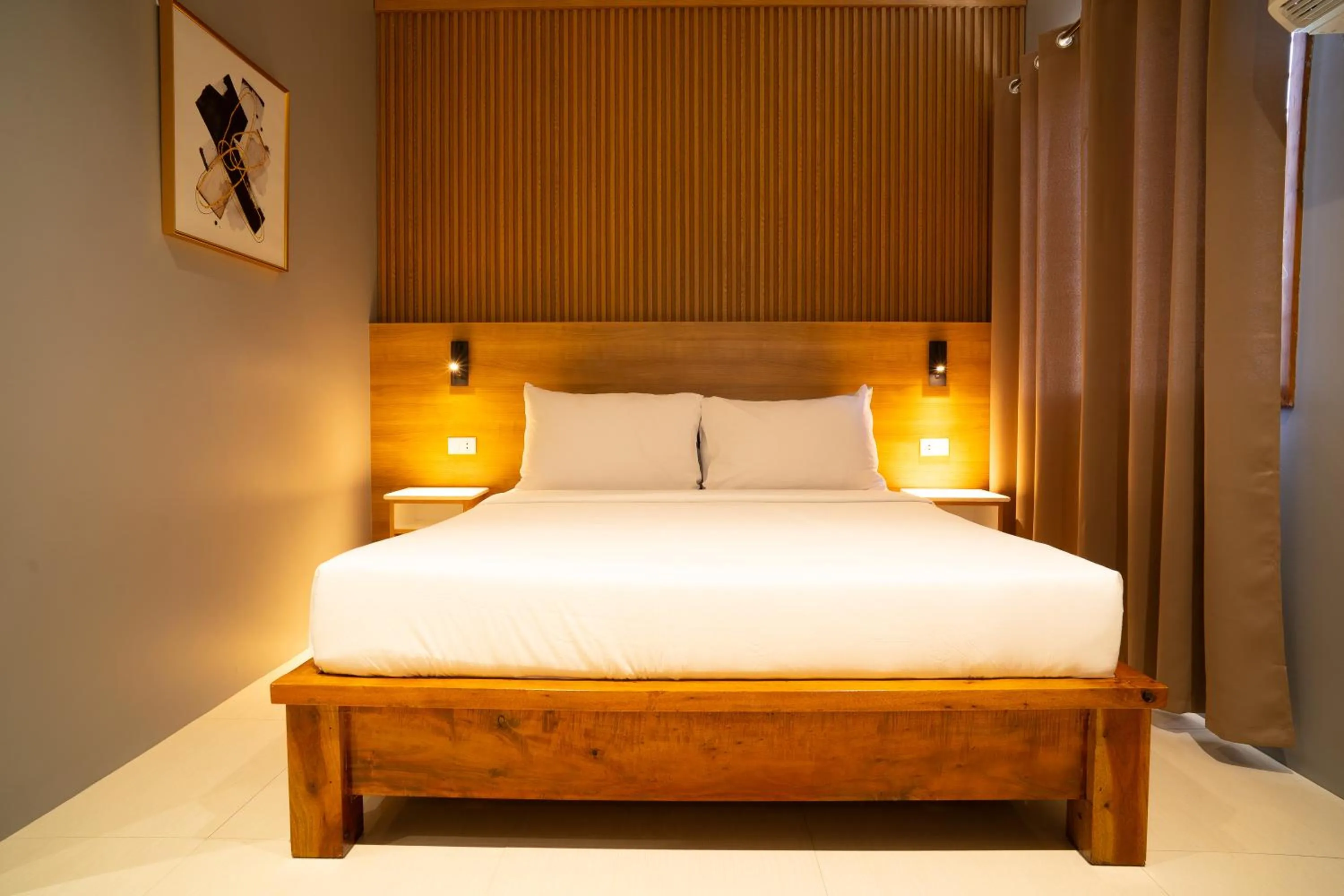 Bed in Madonna Hometel and Suites New Pandan