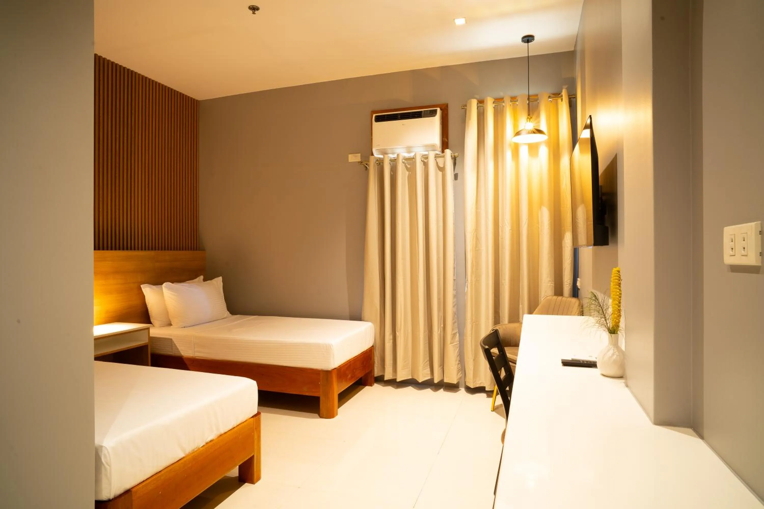 Bed in Madonna Hometel and Suites New Pandan