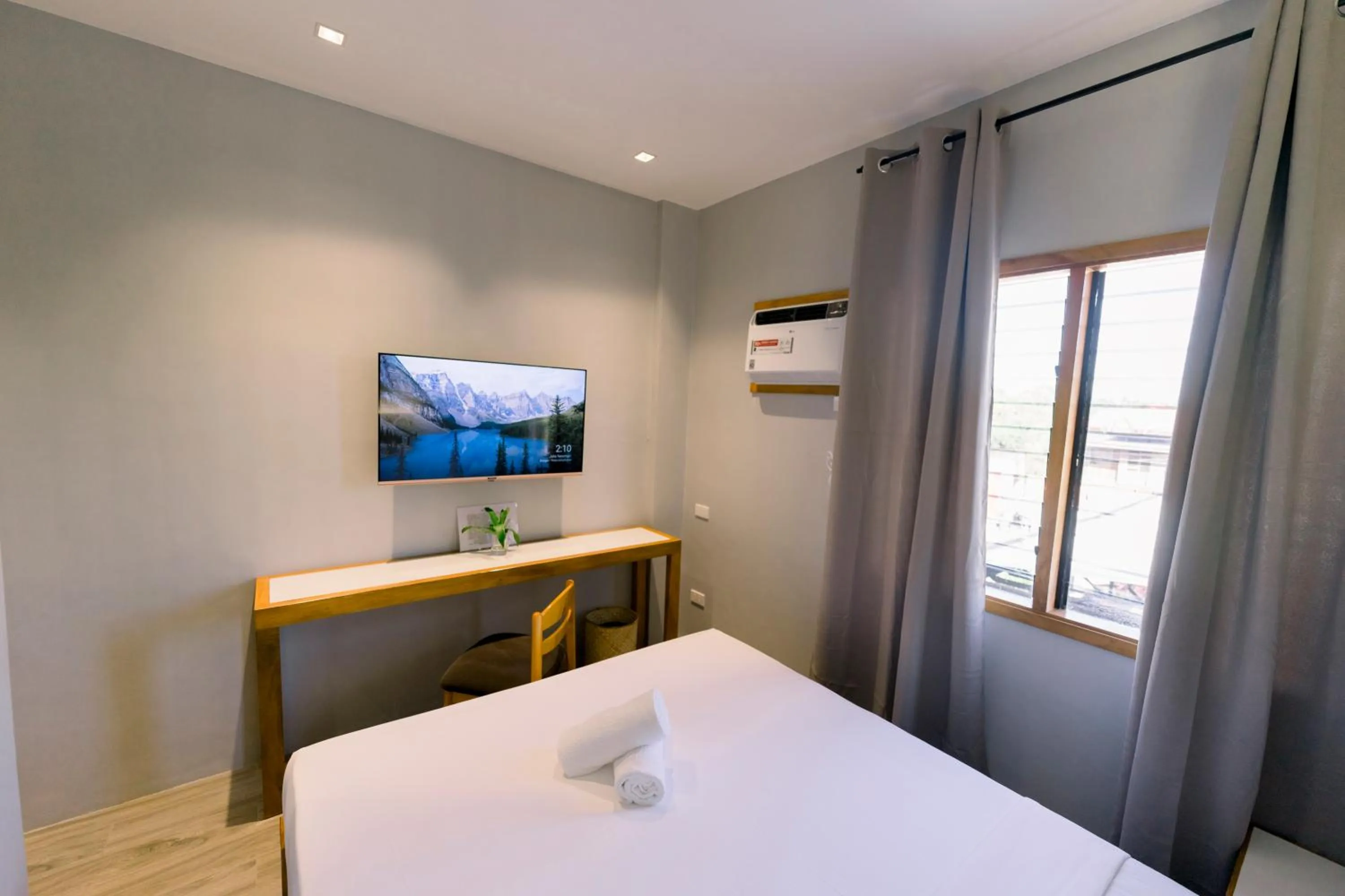 Bed in Madonna Hometel and Suites New Pandan