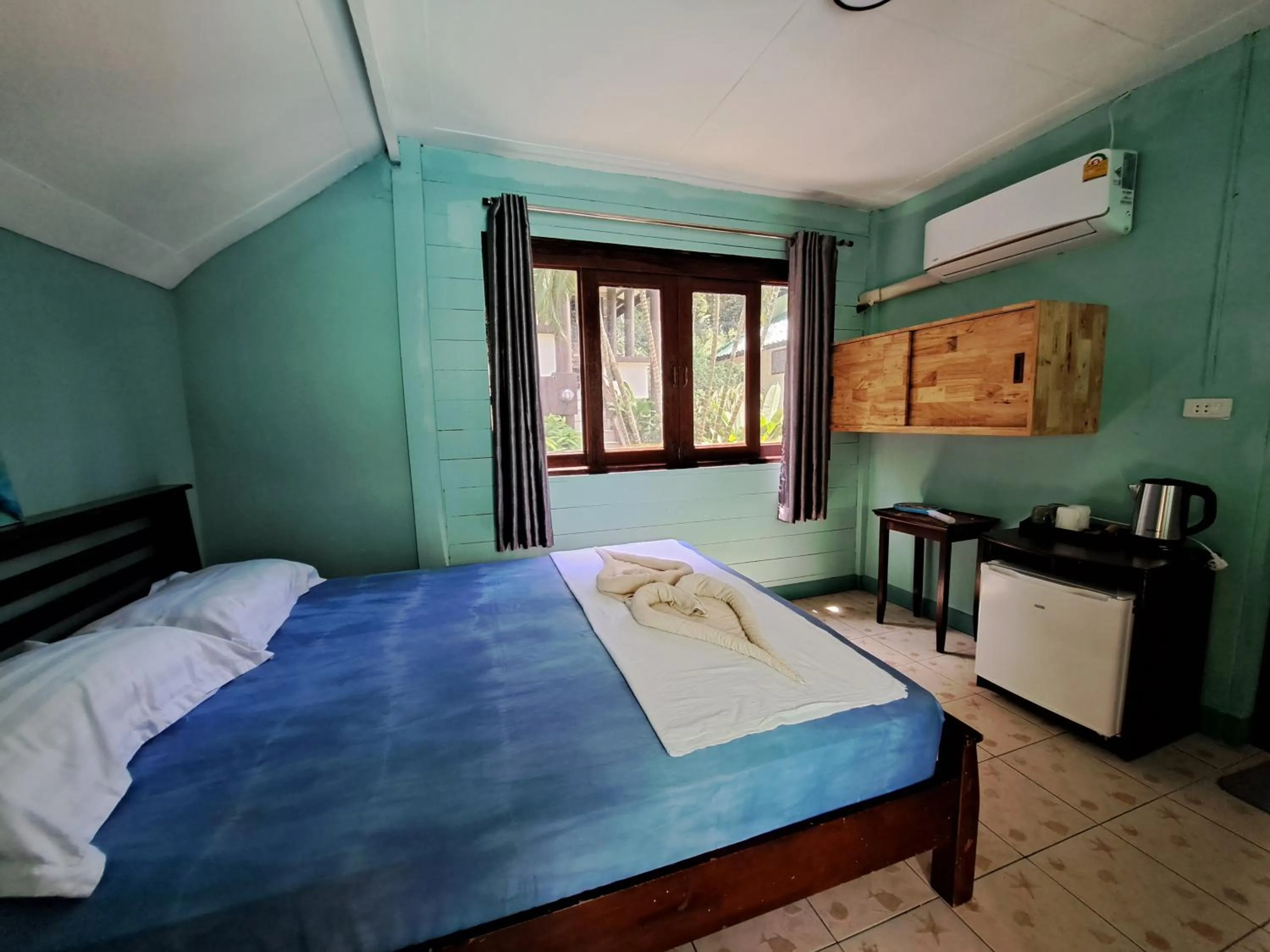 Photo of the whole room, Bed in Sense Asia