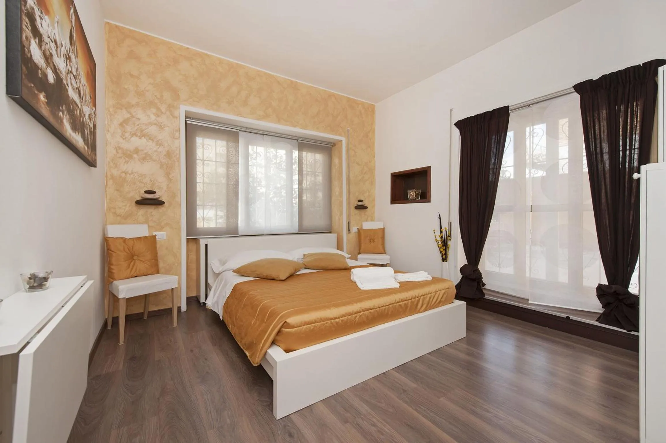 Photo of the whole room, Bed in De Guestibus