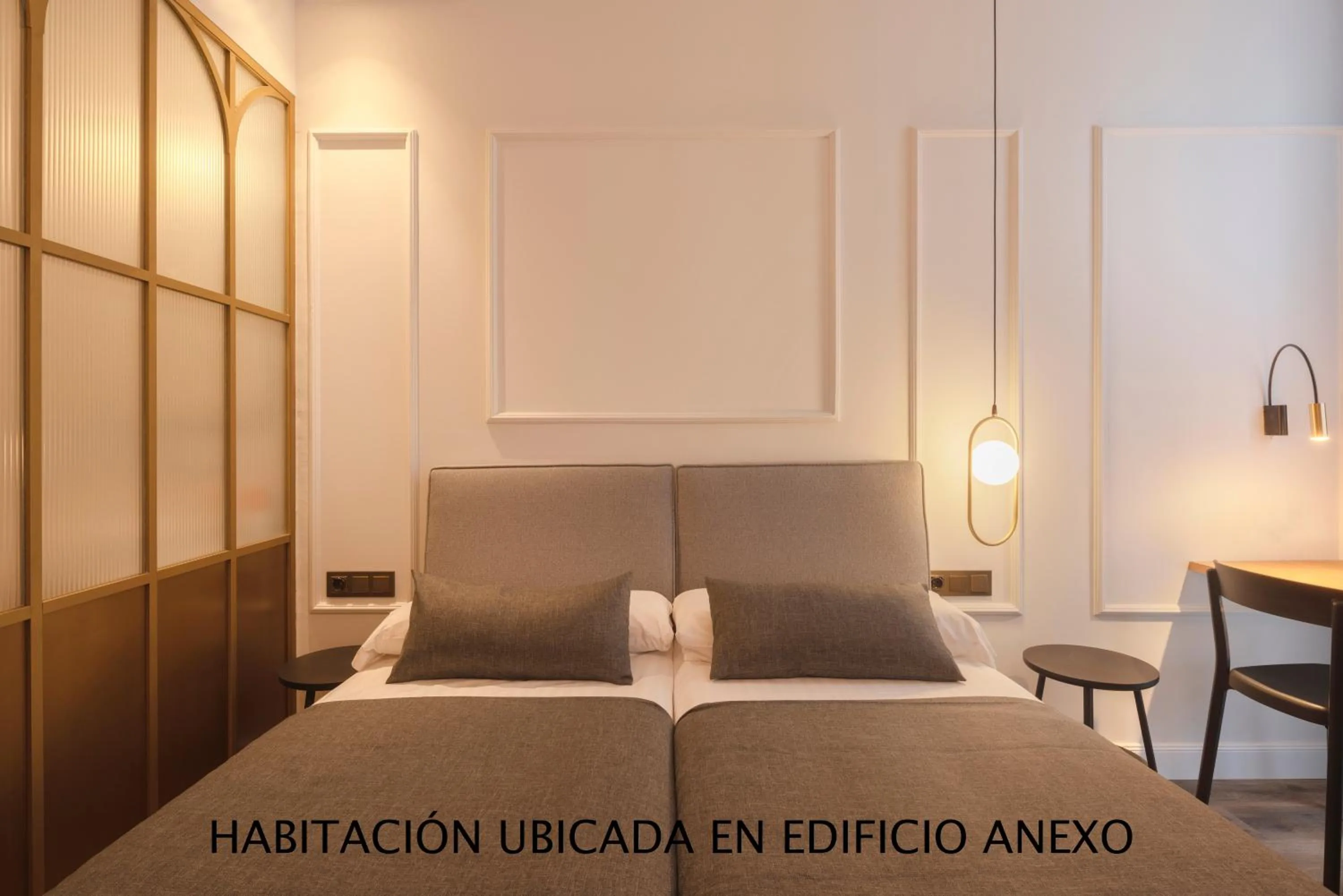 Bed in Hotel Conqueridor