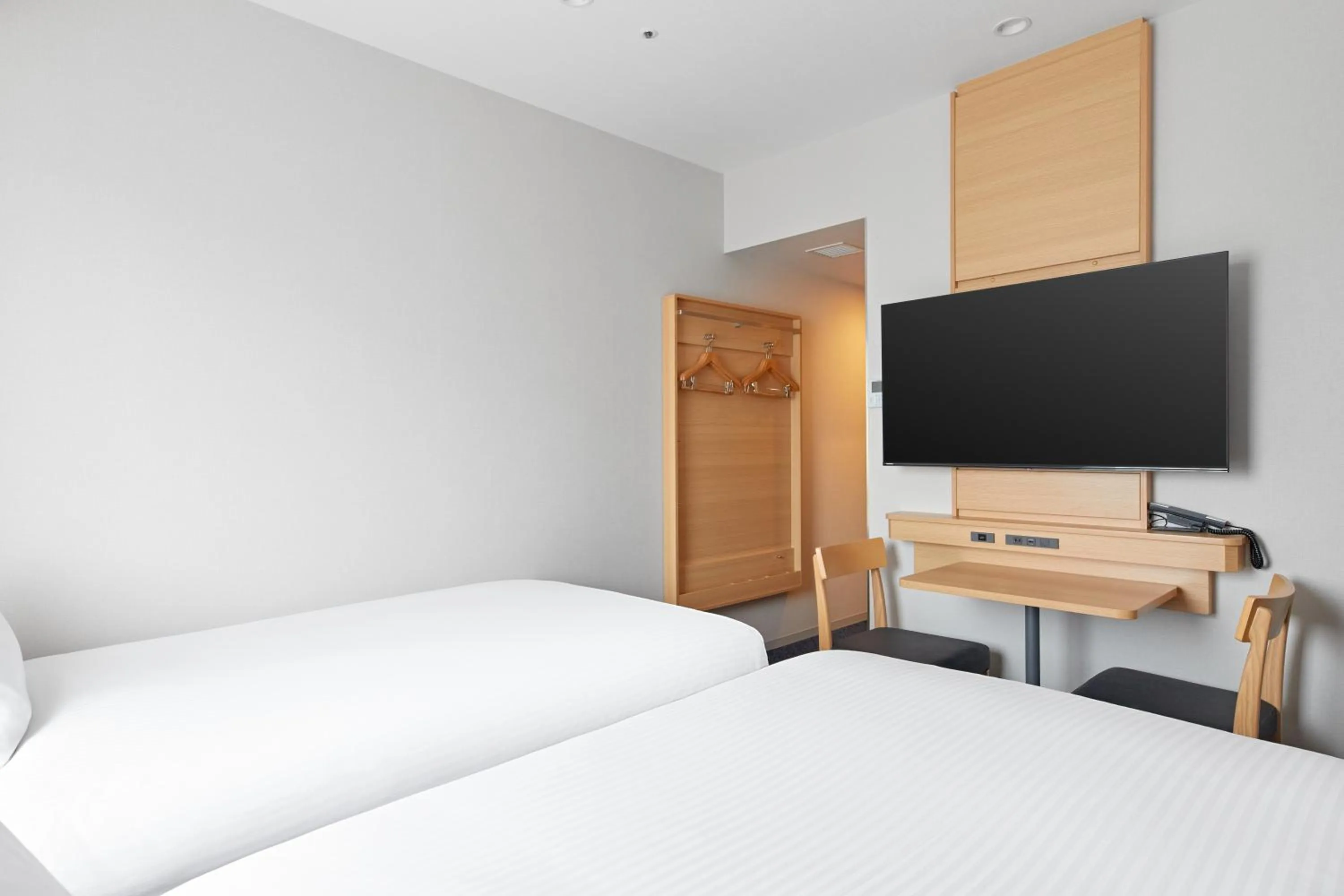 Photo of the whole room, Bed in Sotetsu Fresa Inn Yodoyabashi