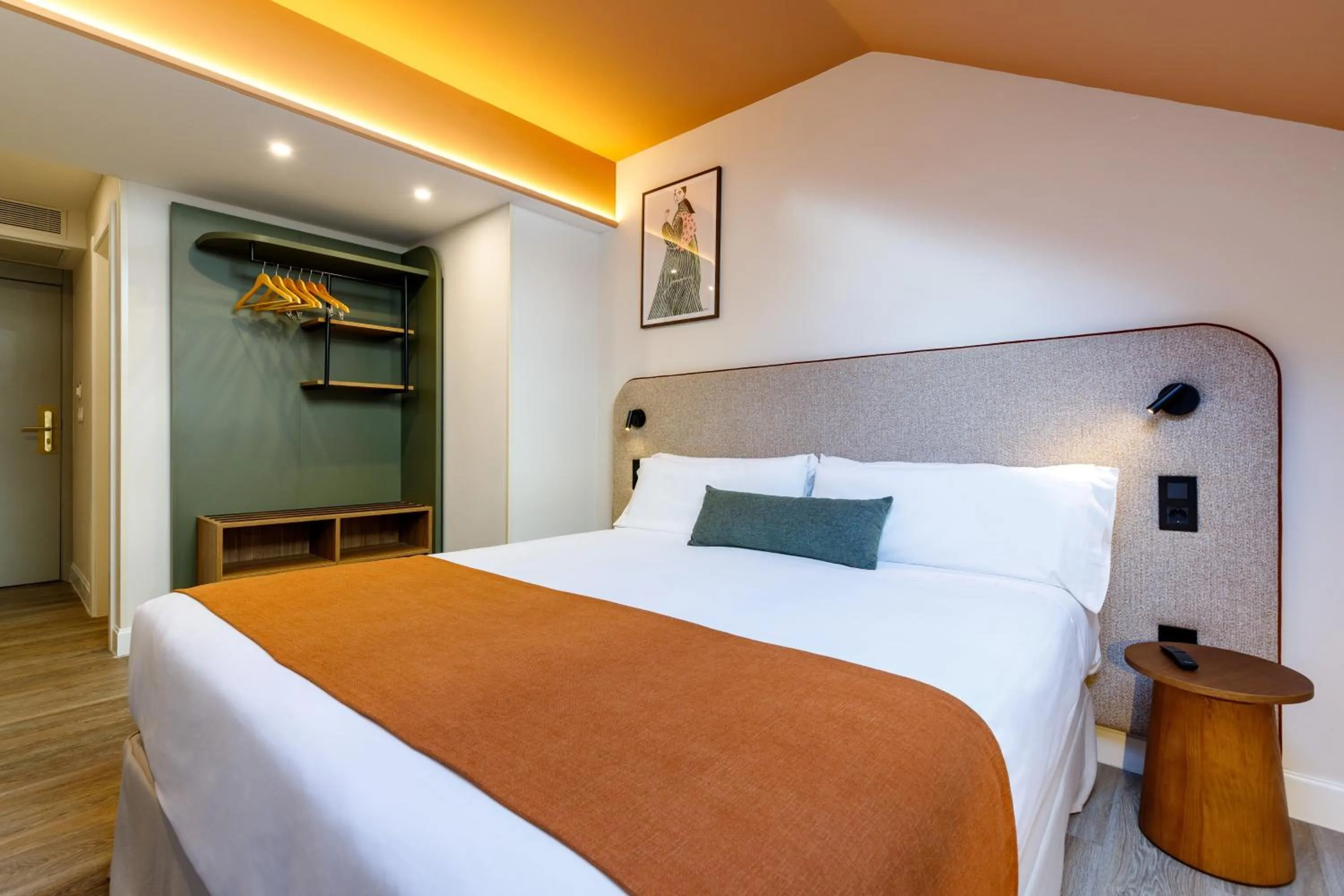 Bed in Petit Palace Puerta del Sol