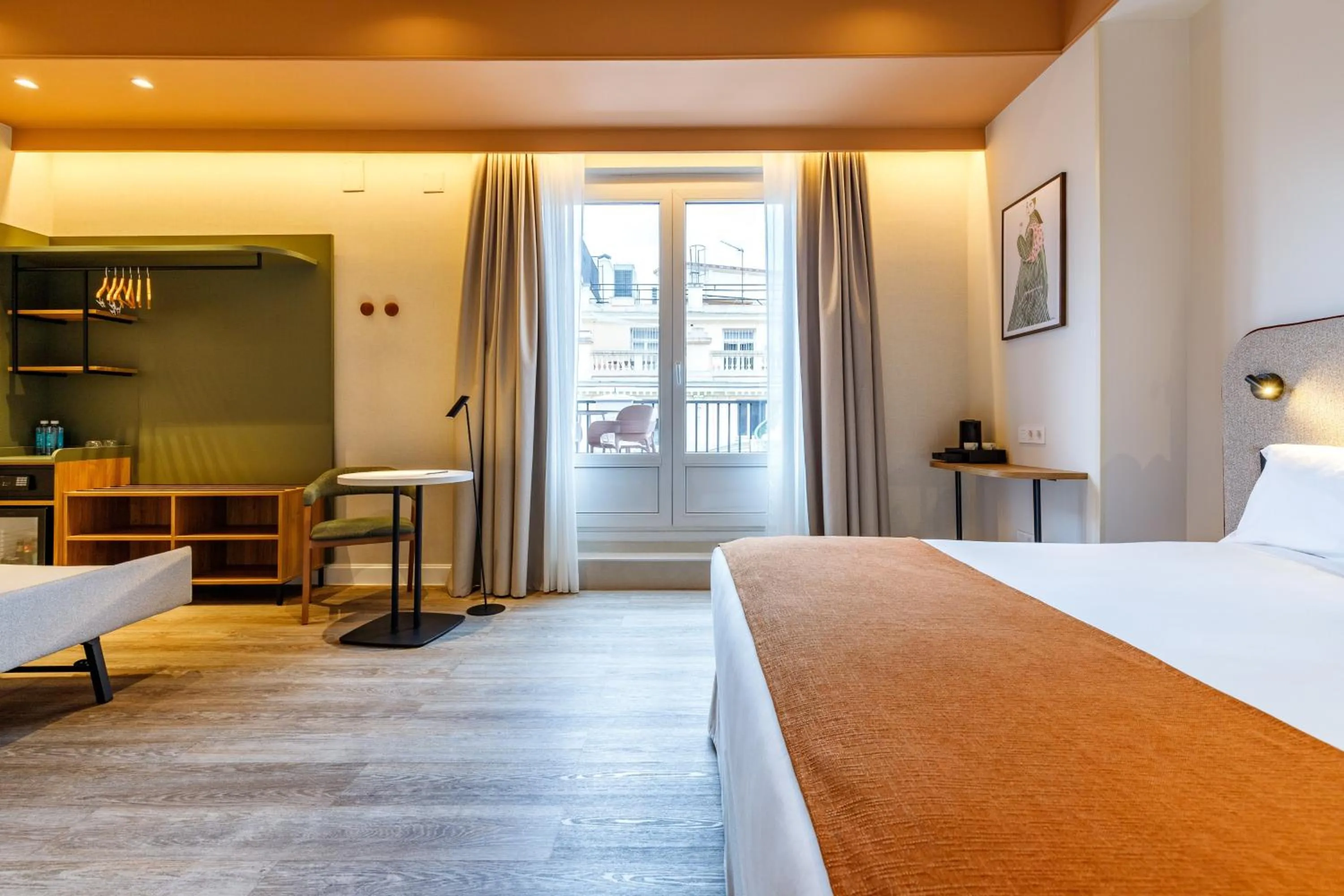 Bed in Petit Palace Puerta del Sol