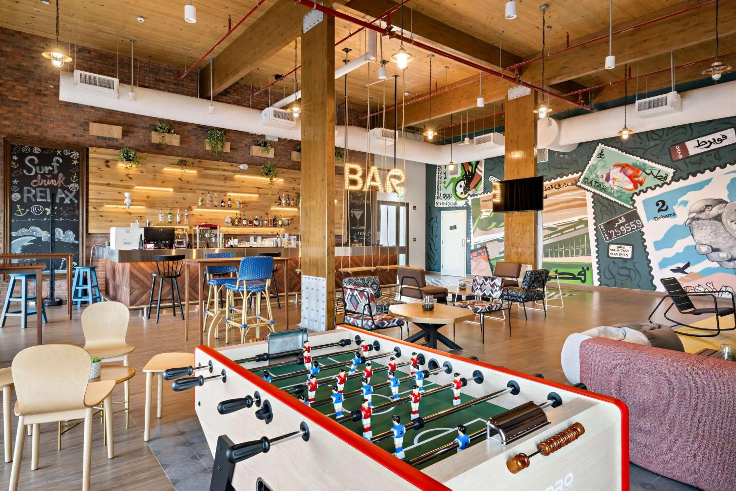 Lounge or bar in Fuwairit Kite Beach, Tapestry Collection By Hilton