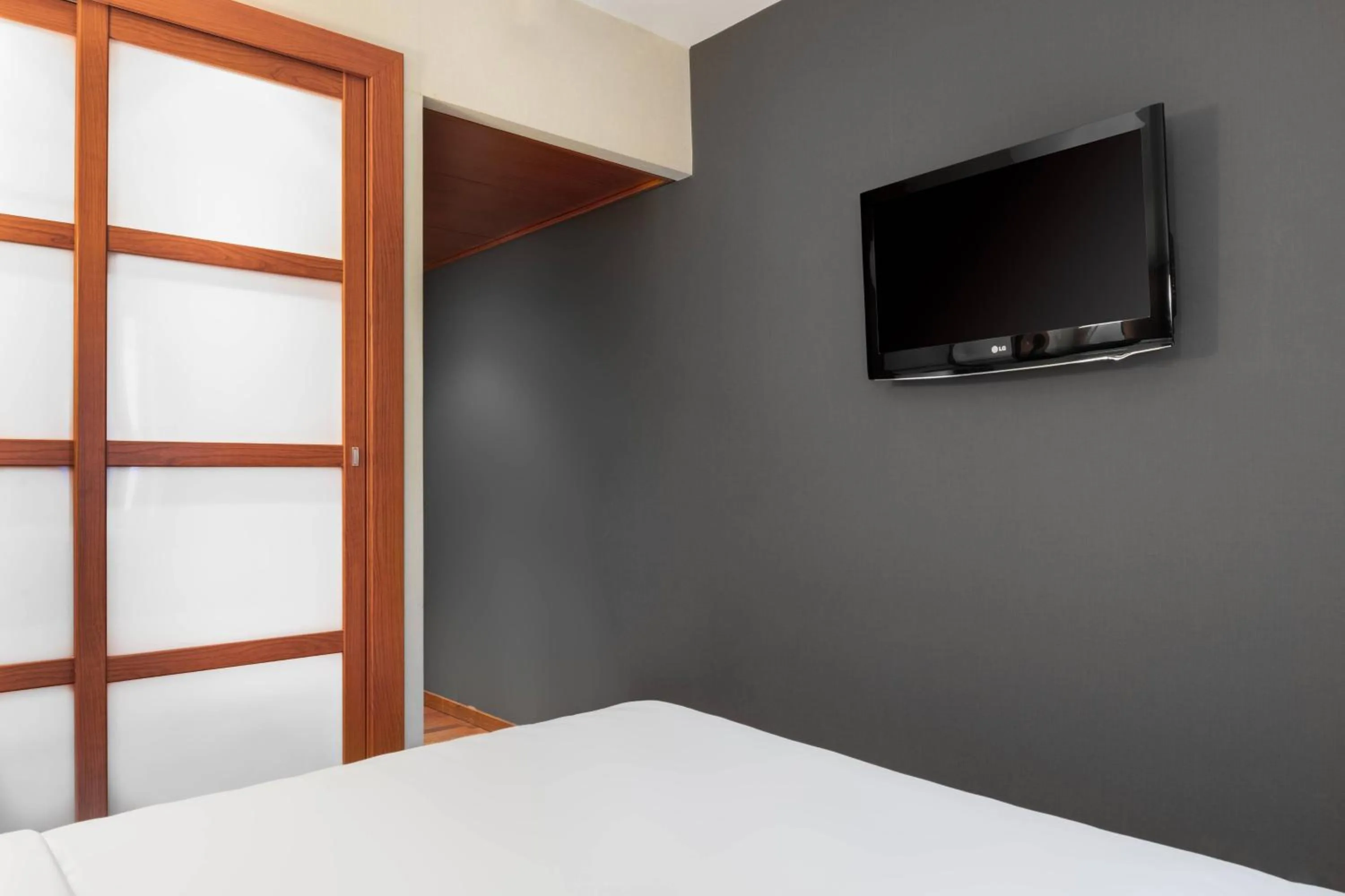 Photo of the whole room, Bed in AC Hotel Ponferrada by Marriott