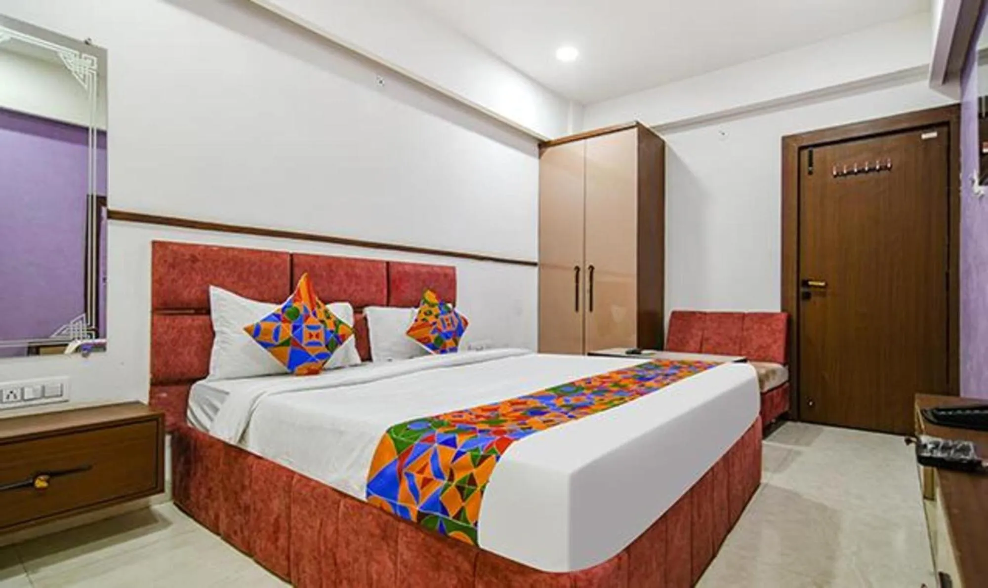 Bed in FabHotel Elite Residency