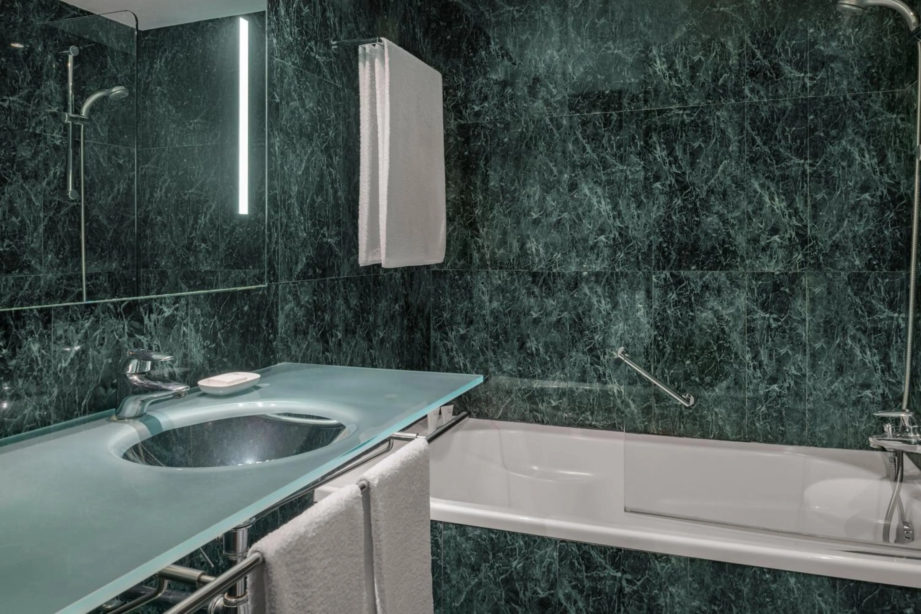 Bathroom in AC Hotel Valencia by Marriott