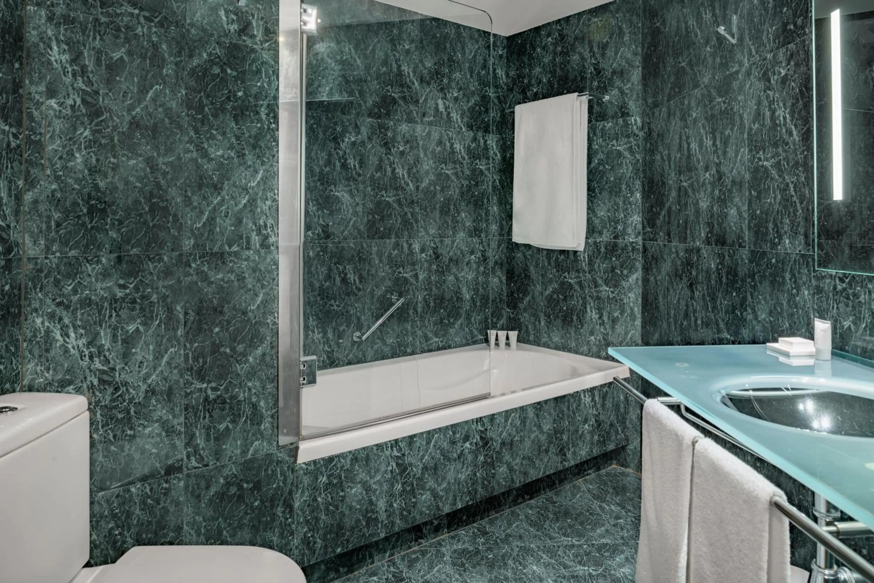 Bathroom in AC Hotel Valencia by Marriott