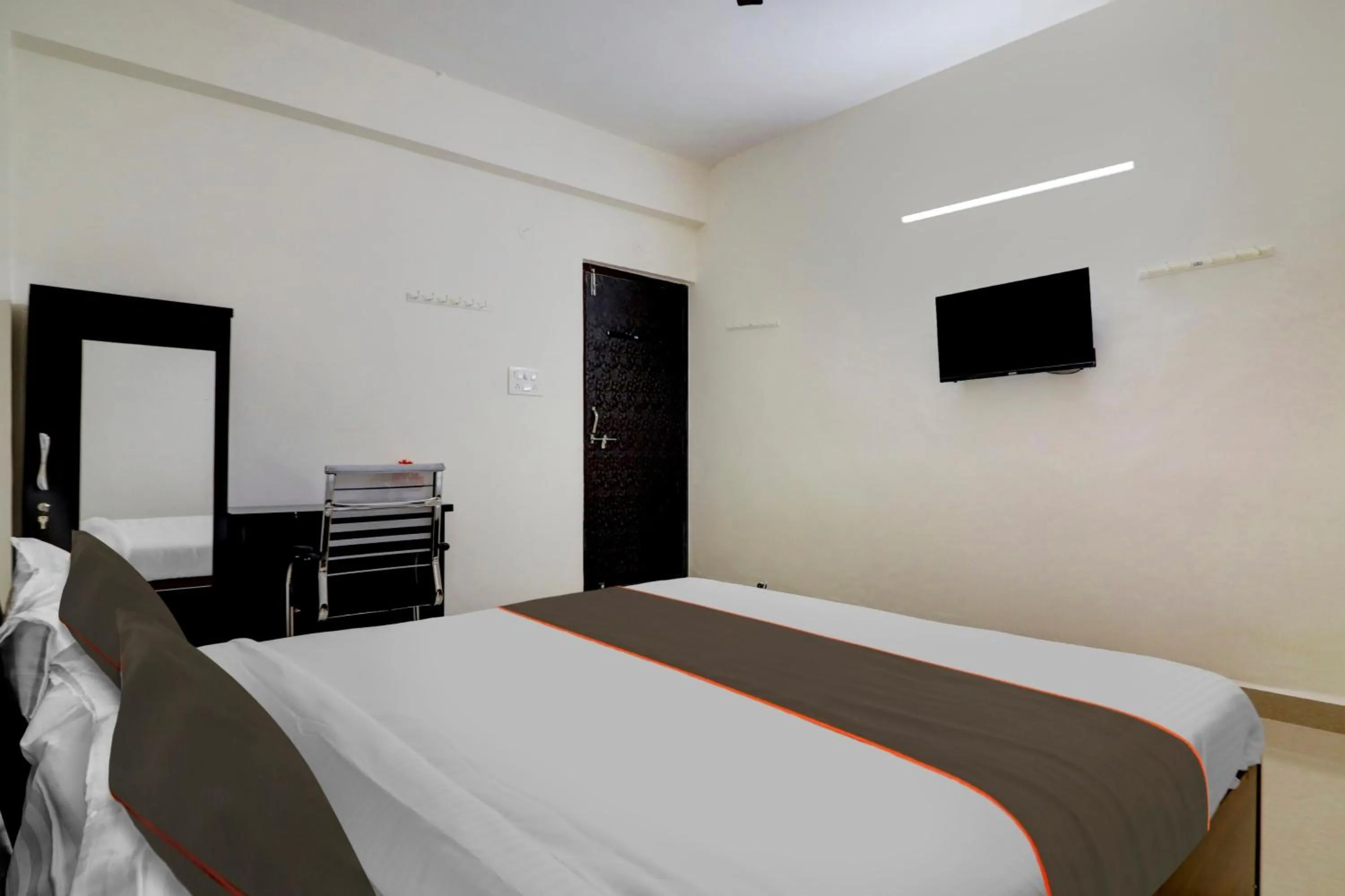 Bedroom, Bed in Capital O S V Residency Nalagandla