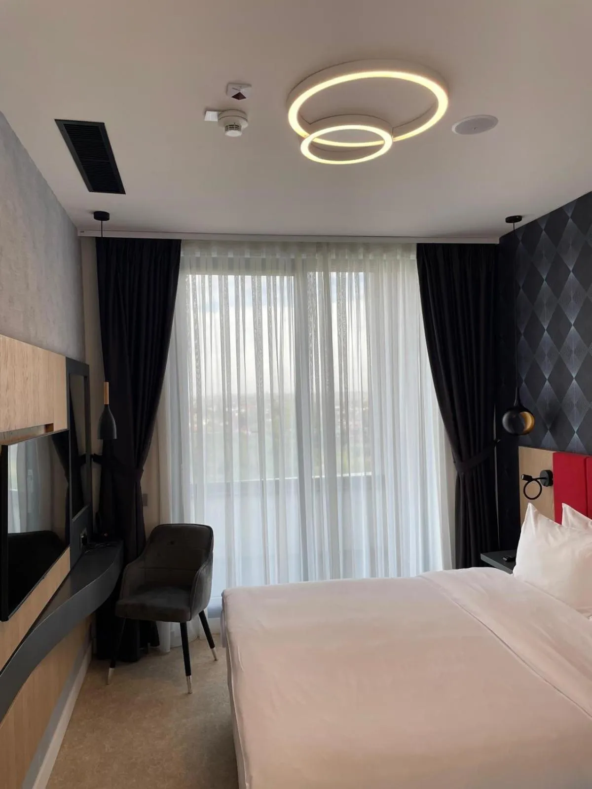 Bed in Ramada by Wyndham Slatina Parc