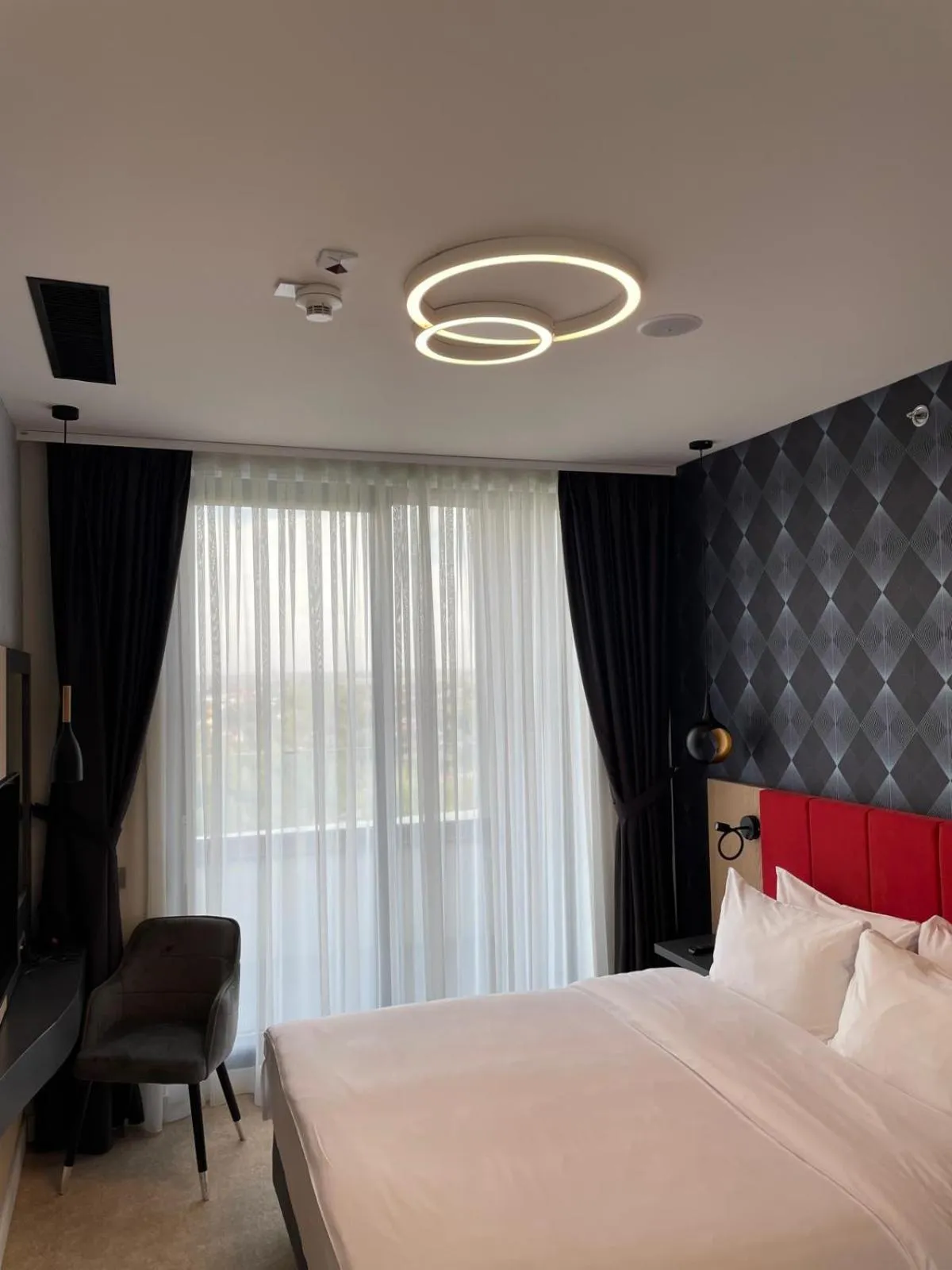 Bed in Ramada by Wyndham Slatina Parc