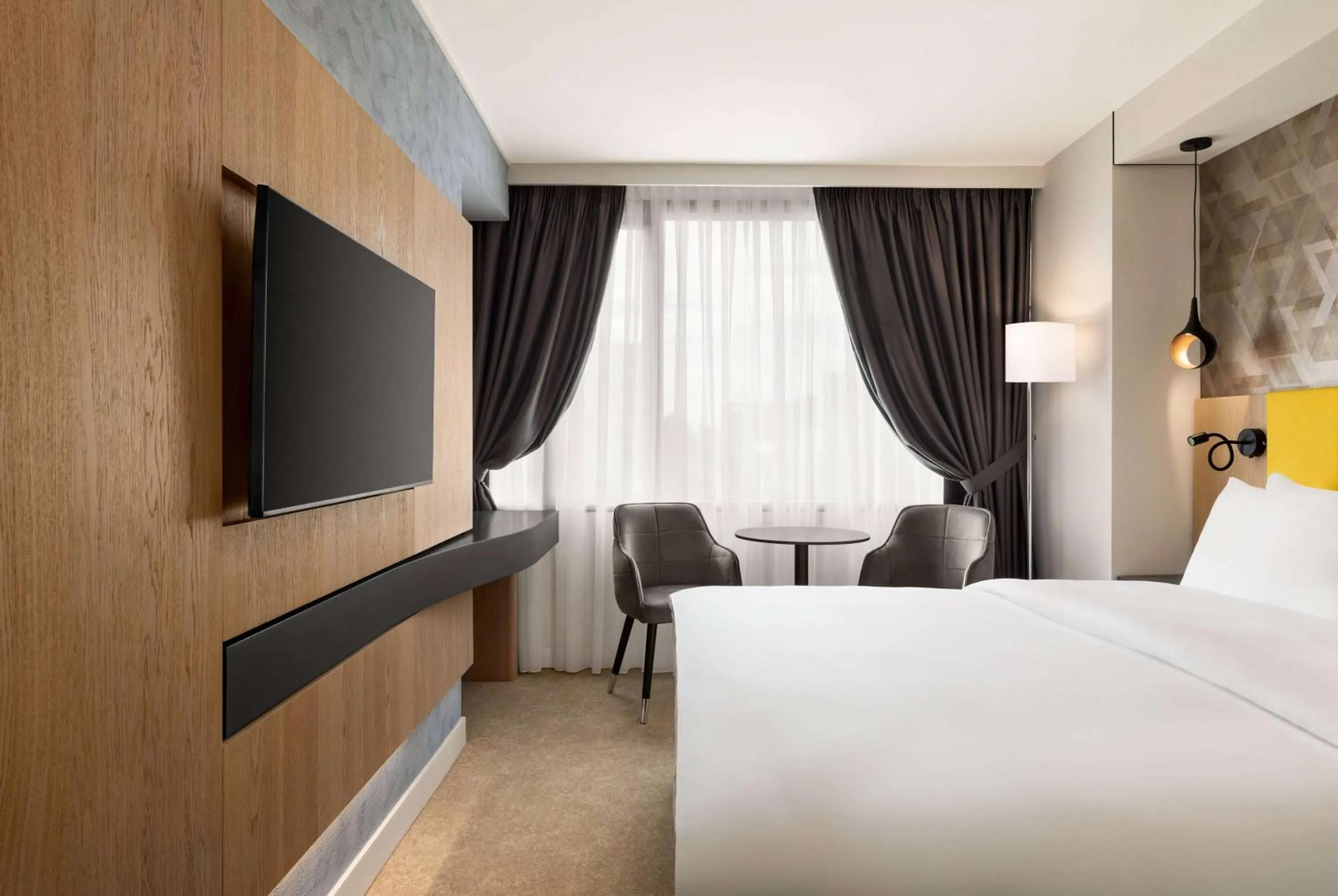 Bed in Ramada by Wyndham Slatina Parc