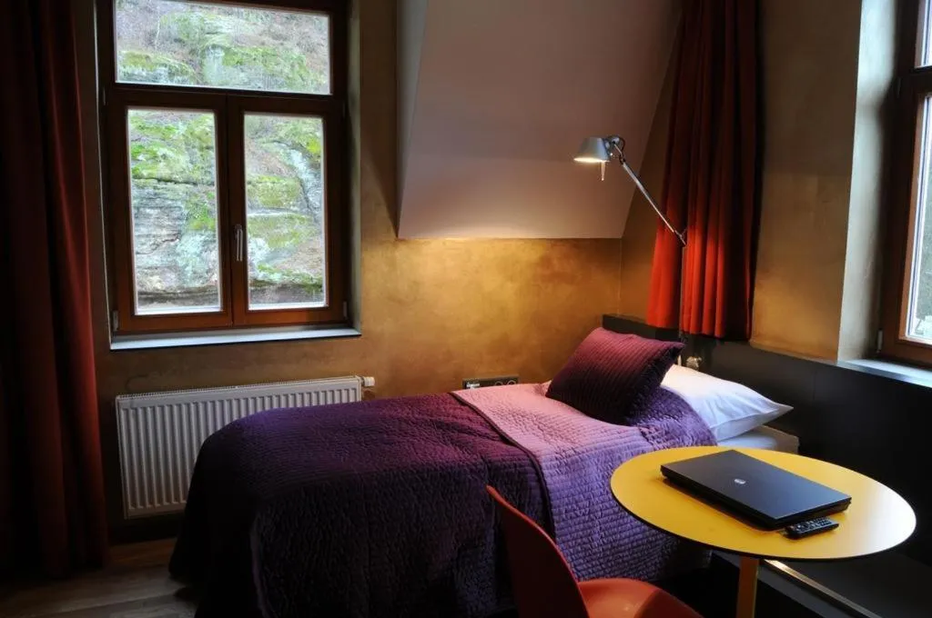 Bed in Hotel Kokořín