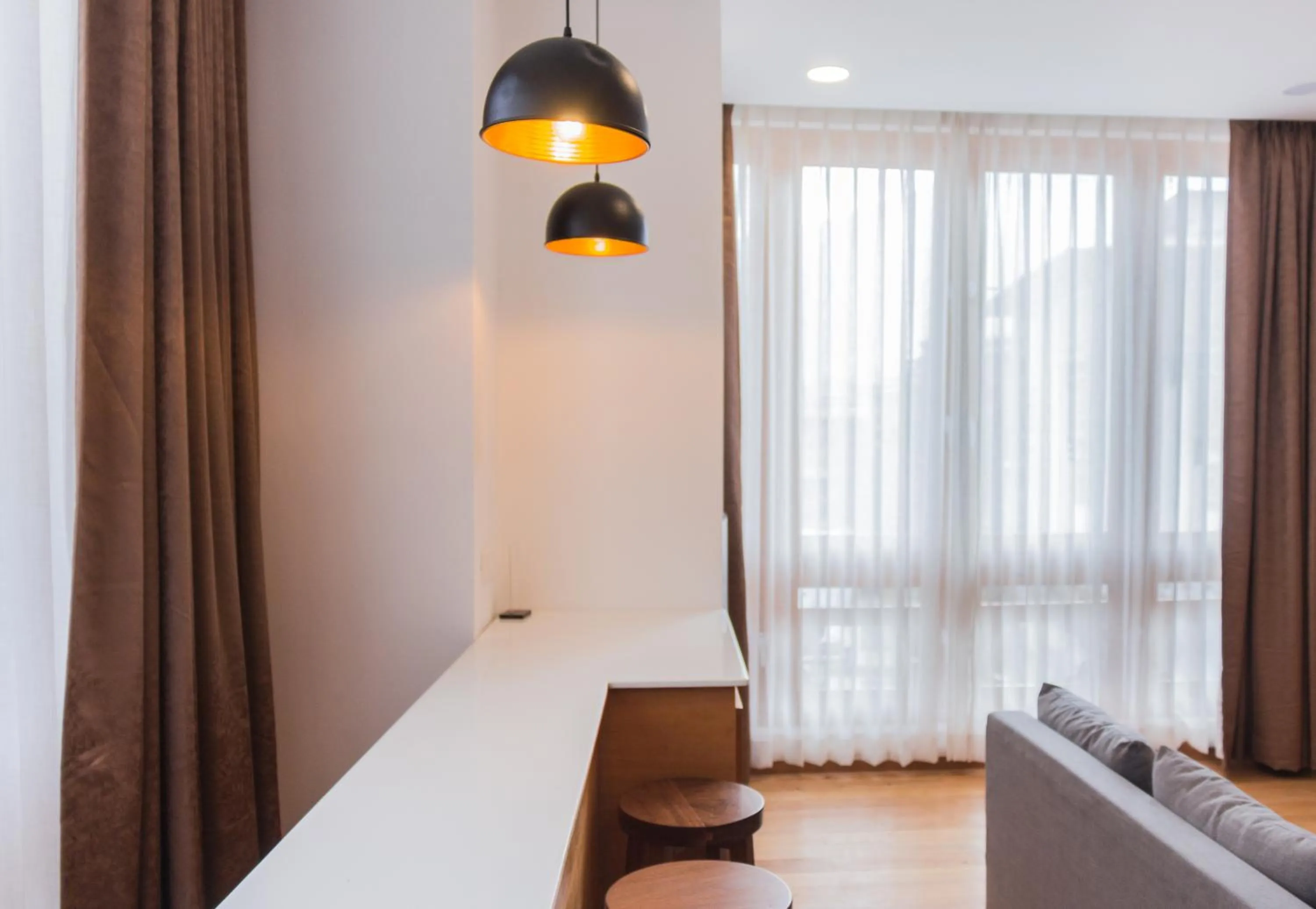 Seating area, Bed in Pelyang Boutique