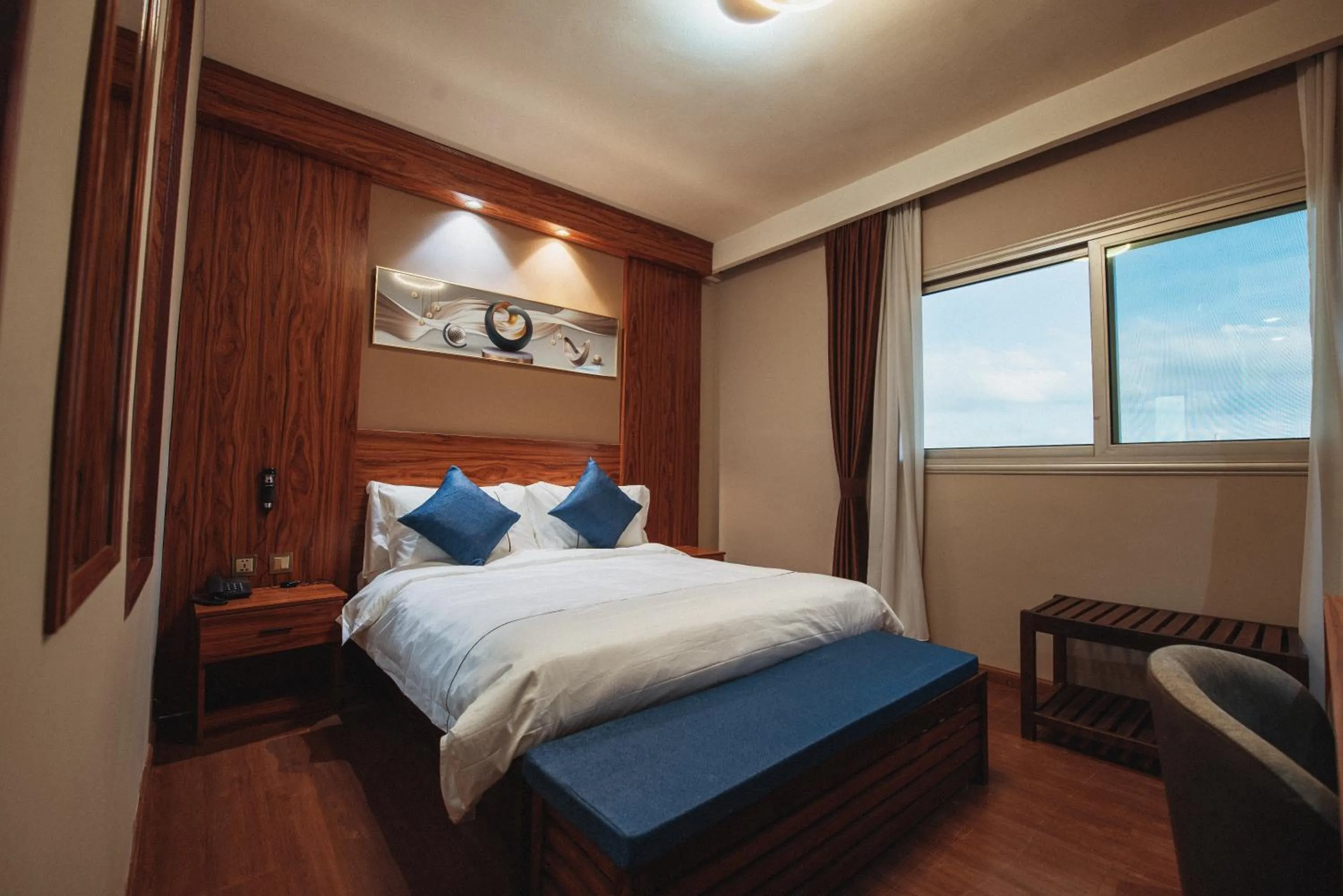 Bed in Atmosphere Hotel & Spa