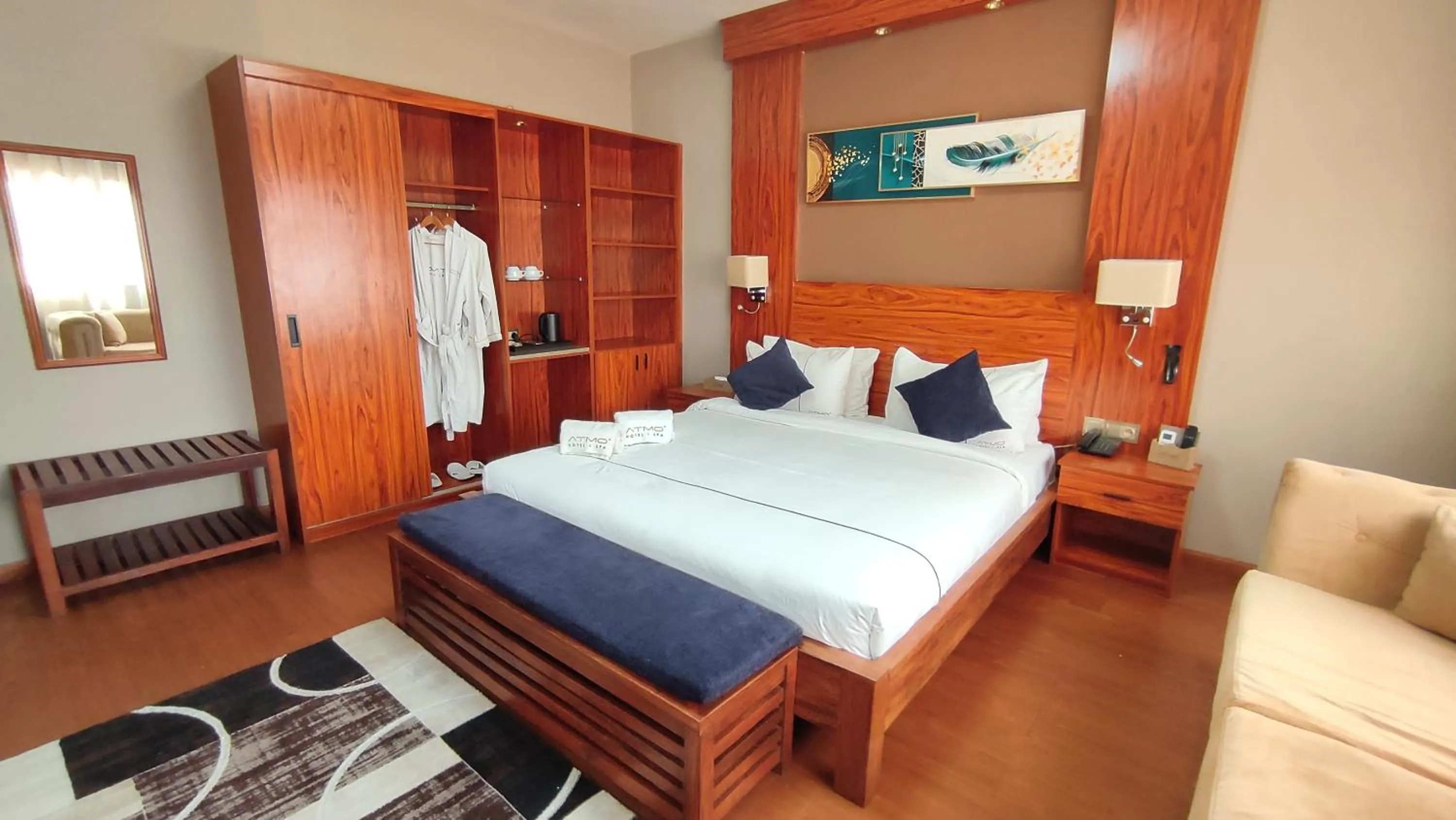 Bed in Atmosphere Hotel & Spa