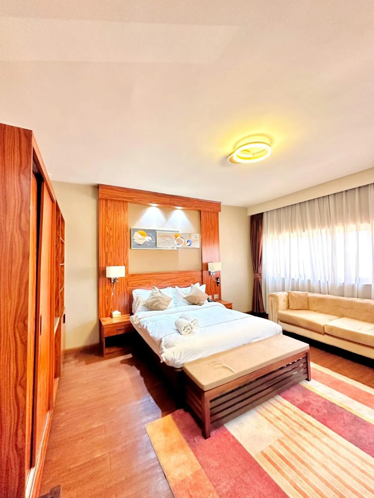 Bed in Atmosphere Hotel & Spa
