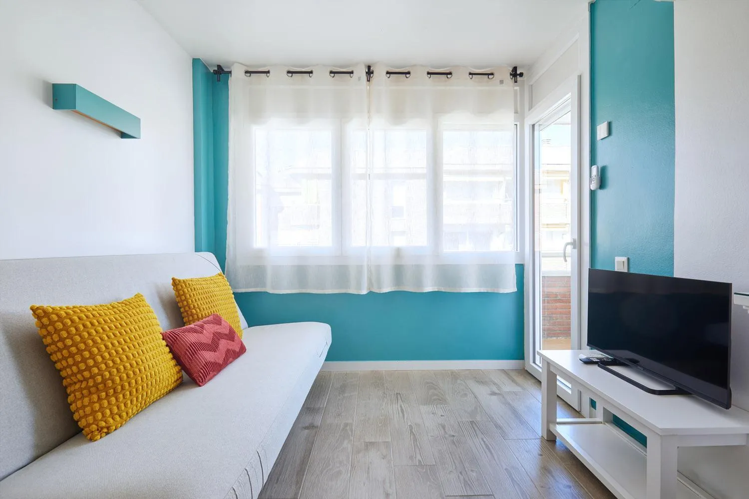 Living room, Bed in Apartamentos Eldorado
