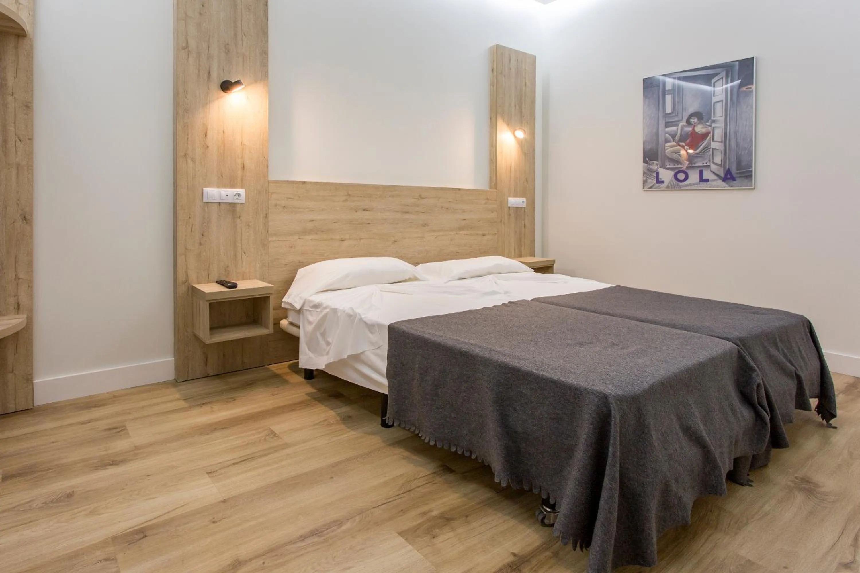 Bed in Hostal Manuela by gaiarooms