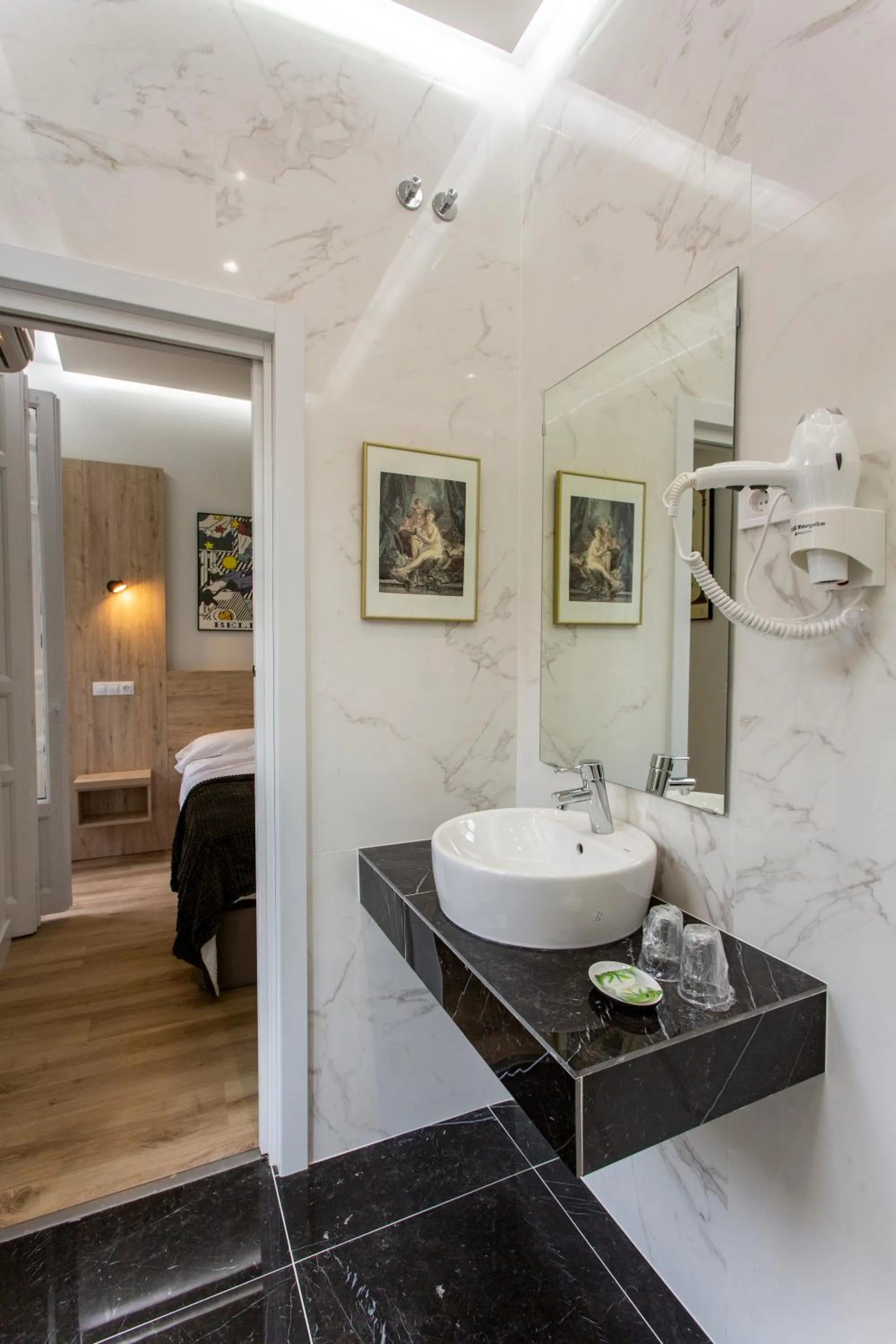 Bathroom in Hostal Manuela by gaiarooms