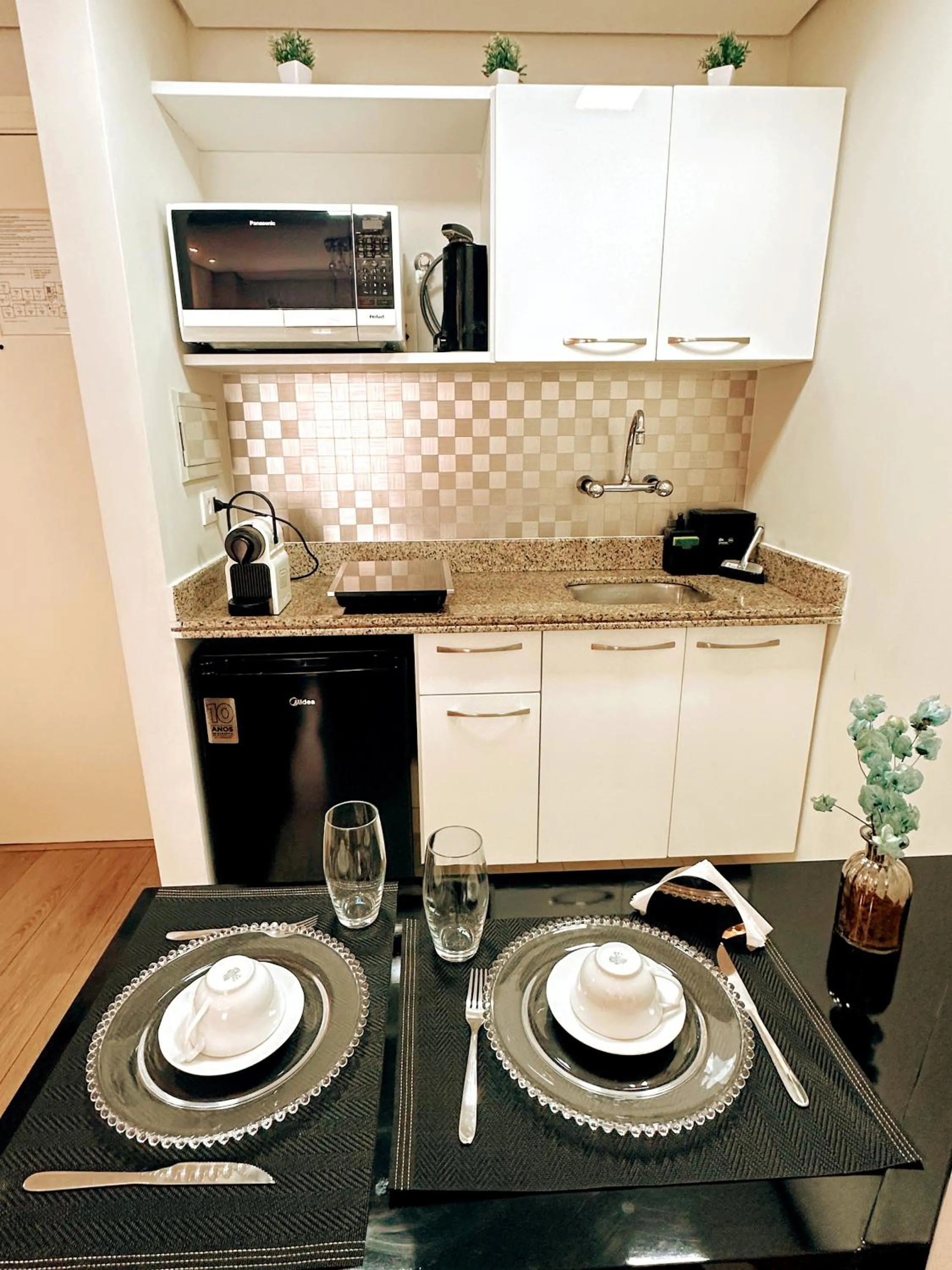 Kitchen or kitchenette in São Paulo Moema Times Square - Suite LUXO