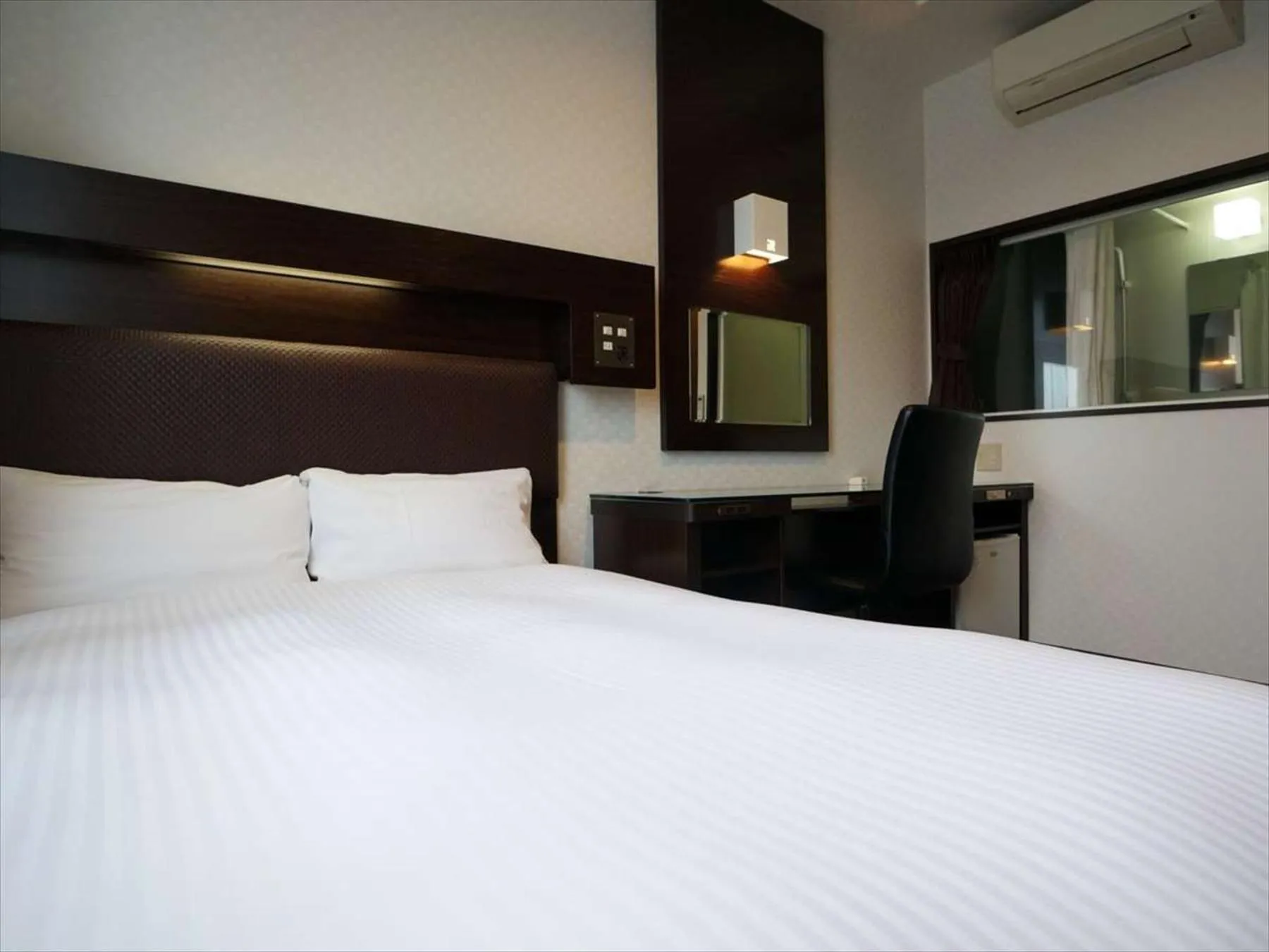 Photo of the whole room, Bed in Green Rich Hotel Osaka Airport