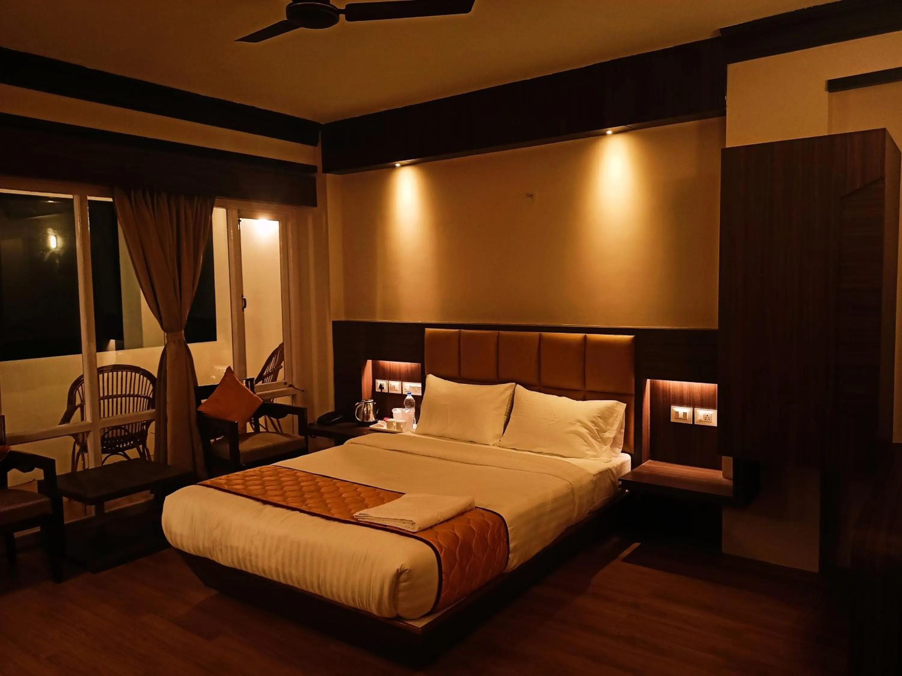 Bed in Golden Peaks Hotel & Restaurant