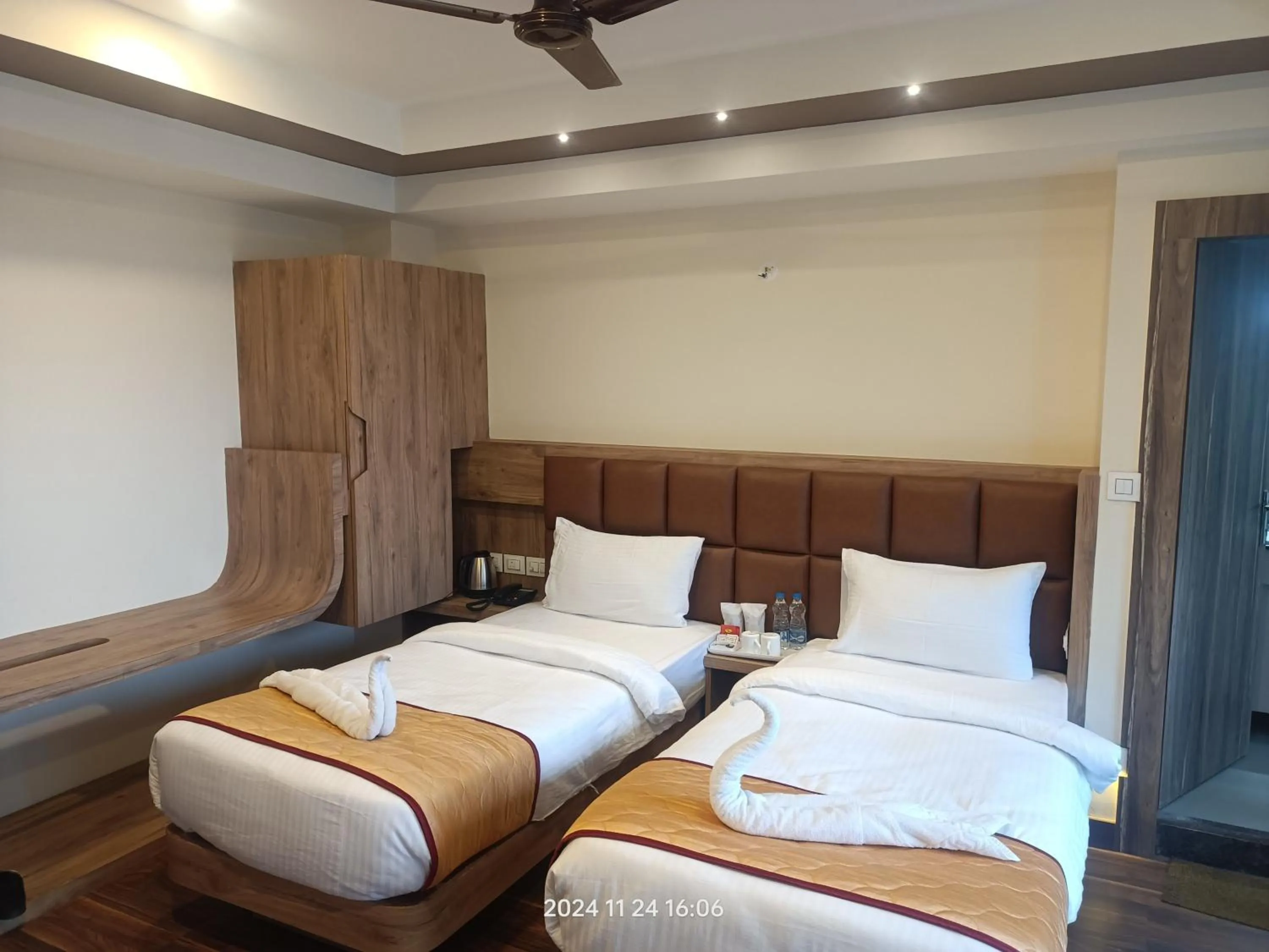 Bed in Golden Peaks Hotel & Restaurant