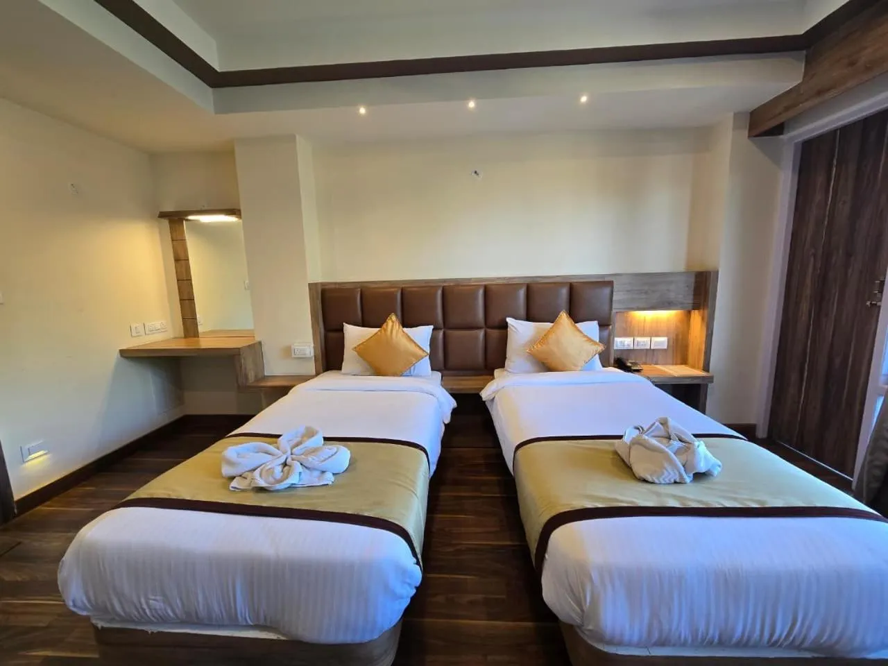 Bed in Golden Peaks Hotel & Restaurant