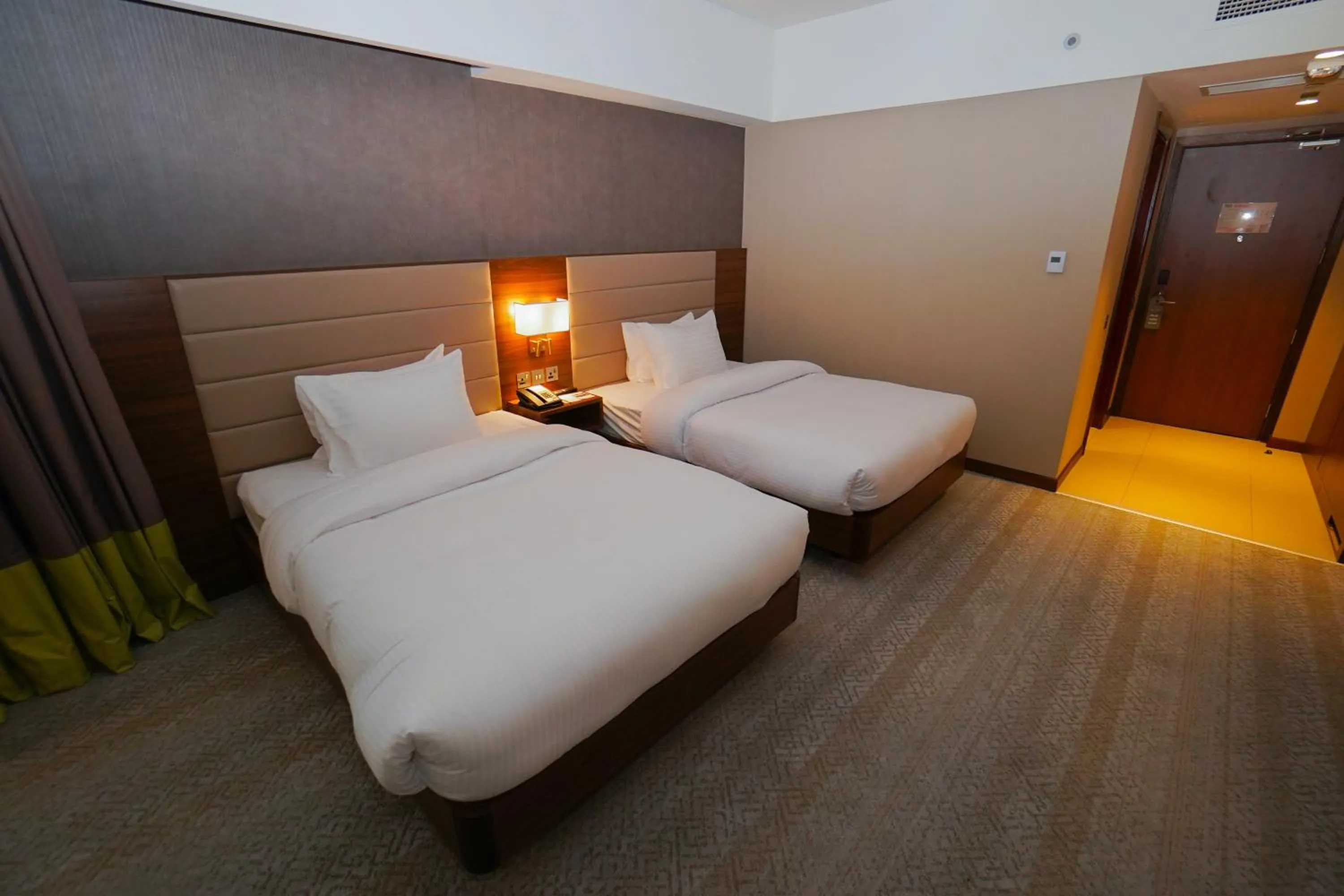 Bed in The Grand Lux Hotel