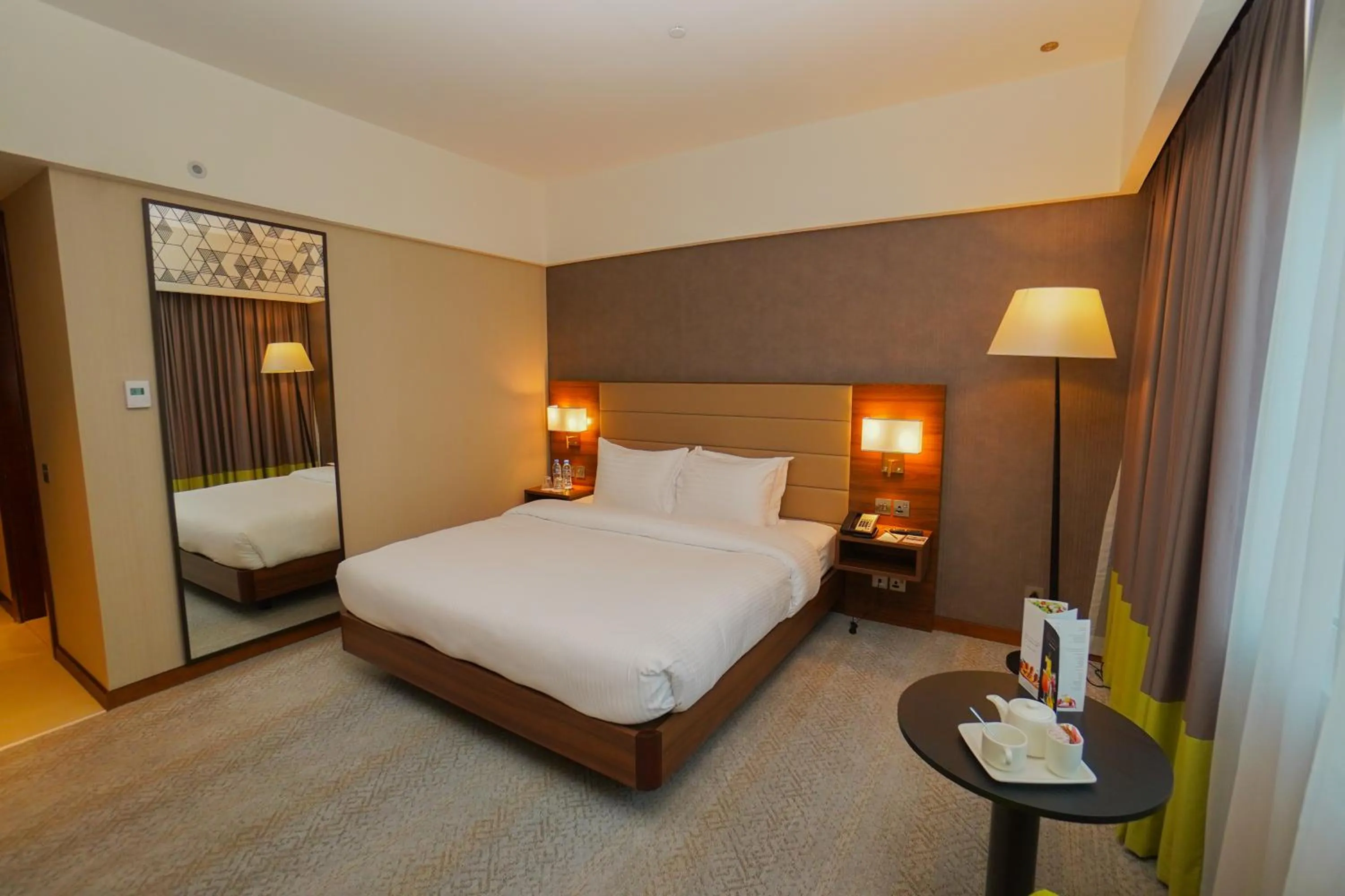 Bed in The Grand Lux Hotel