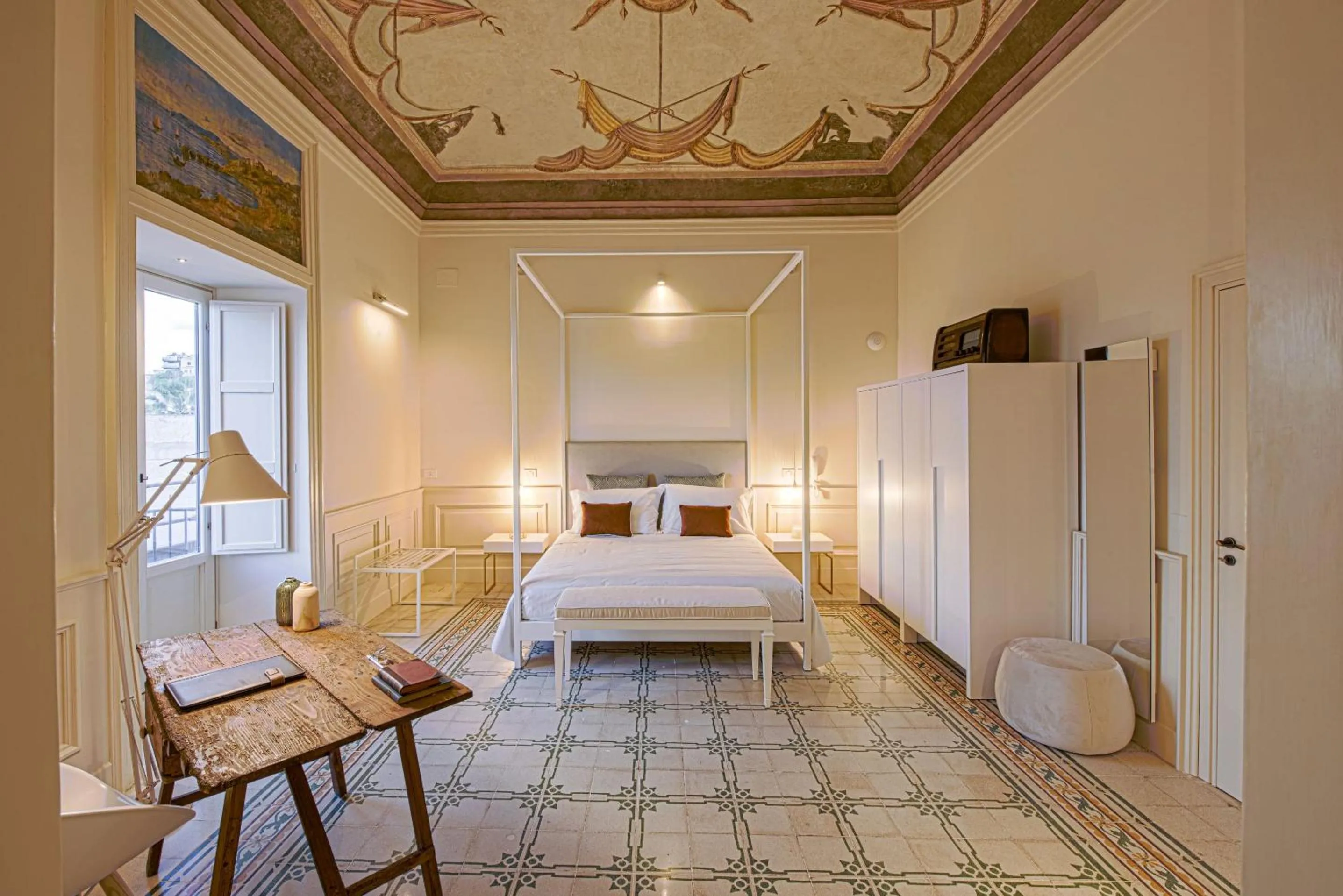 Bed in Costamante Suites & Spa