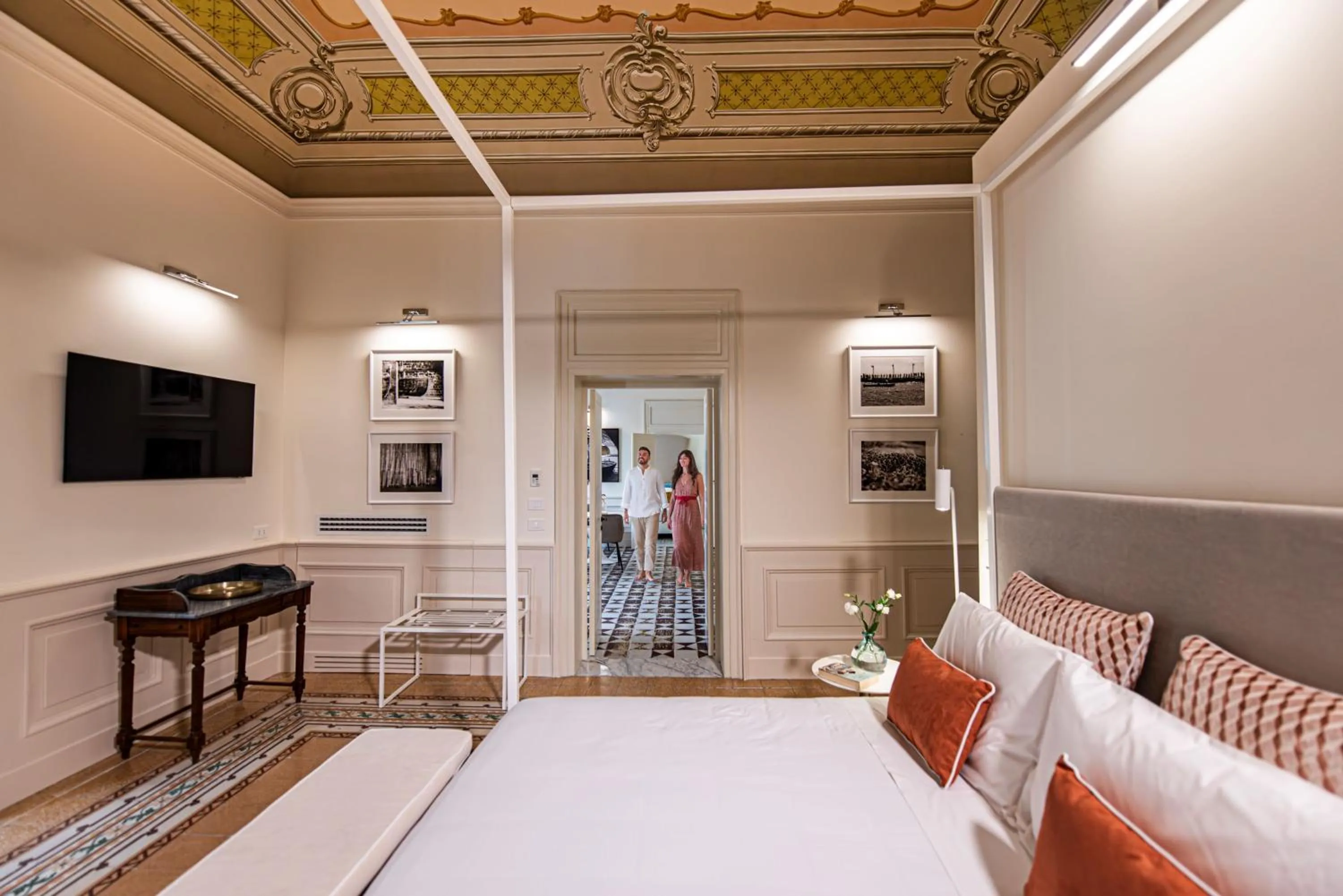 Bed in Costamante Suites & Spa