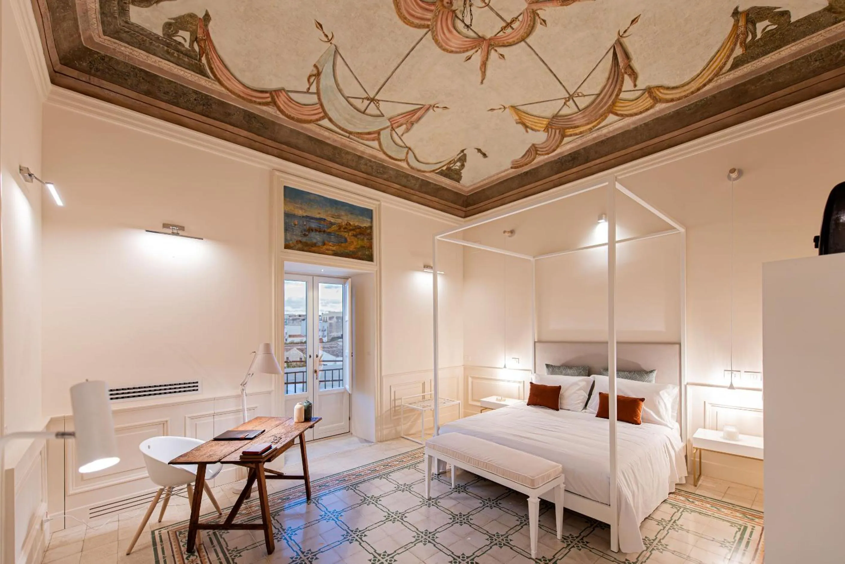 Bed in Costamante Suites & Spa