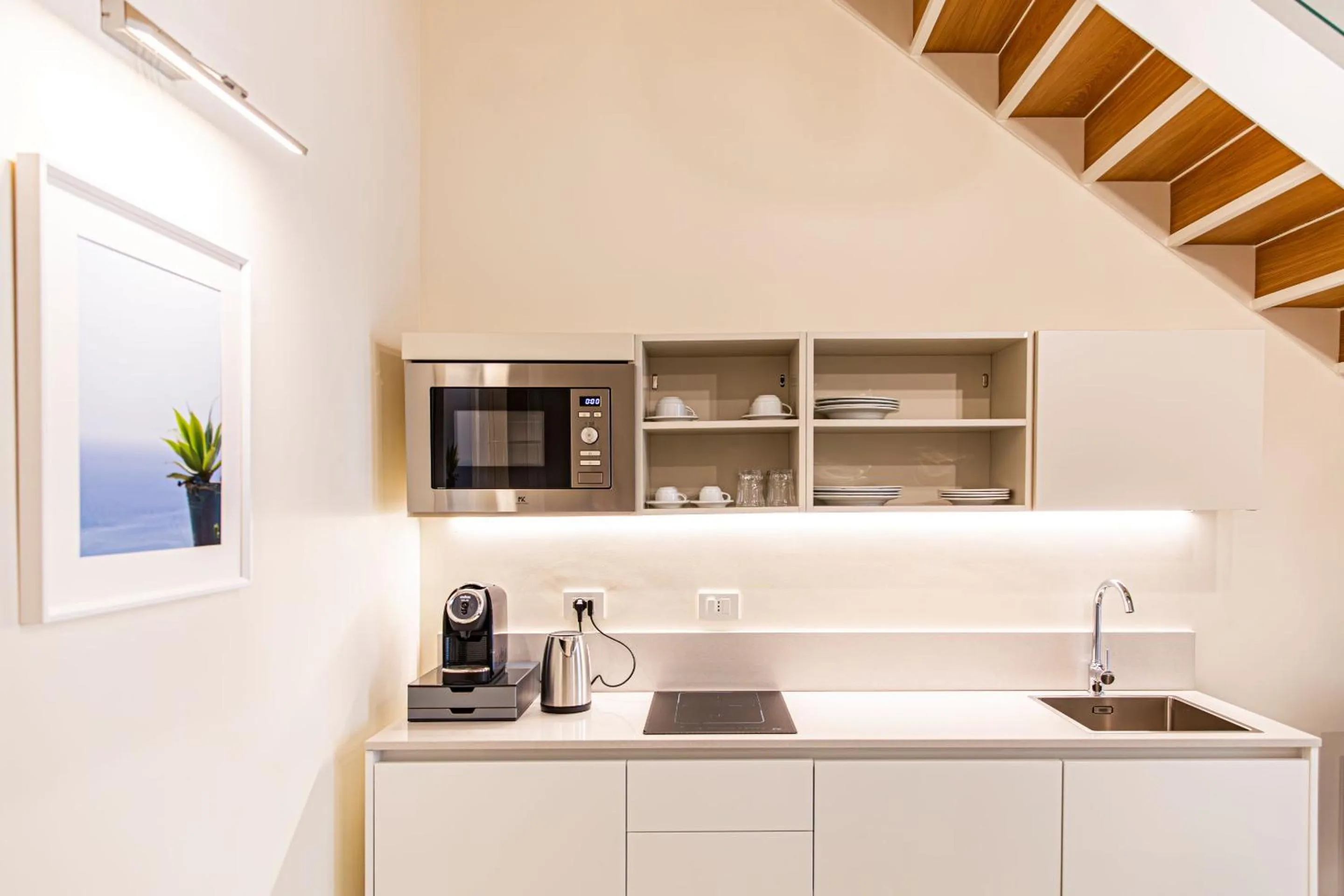 Kitchen or kitchenette in Costamante Suites & Spa
