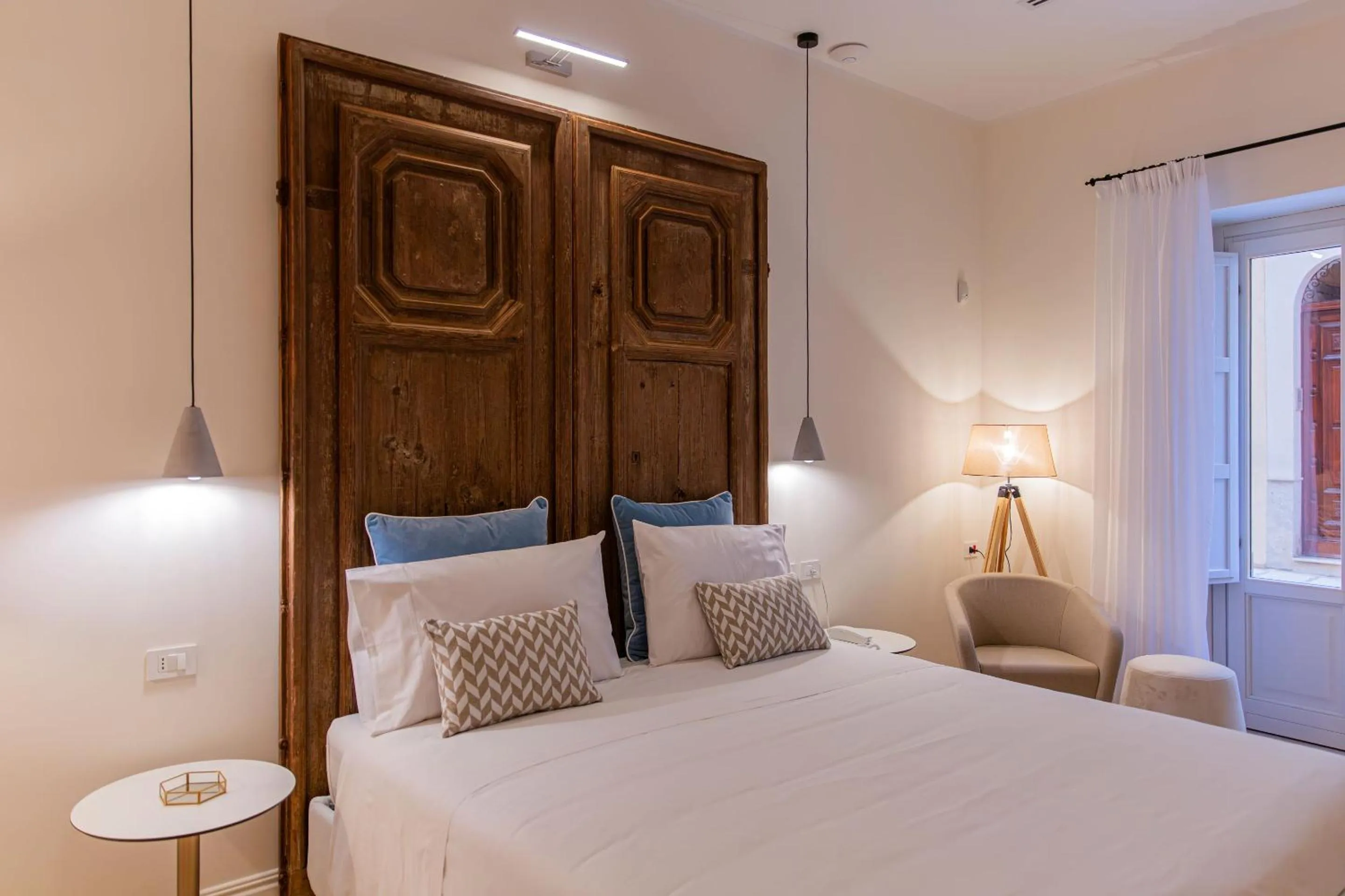 Bed in Costamante Suites & Spa