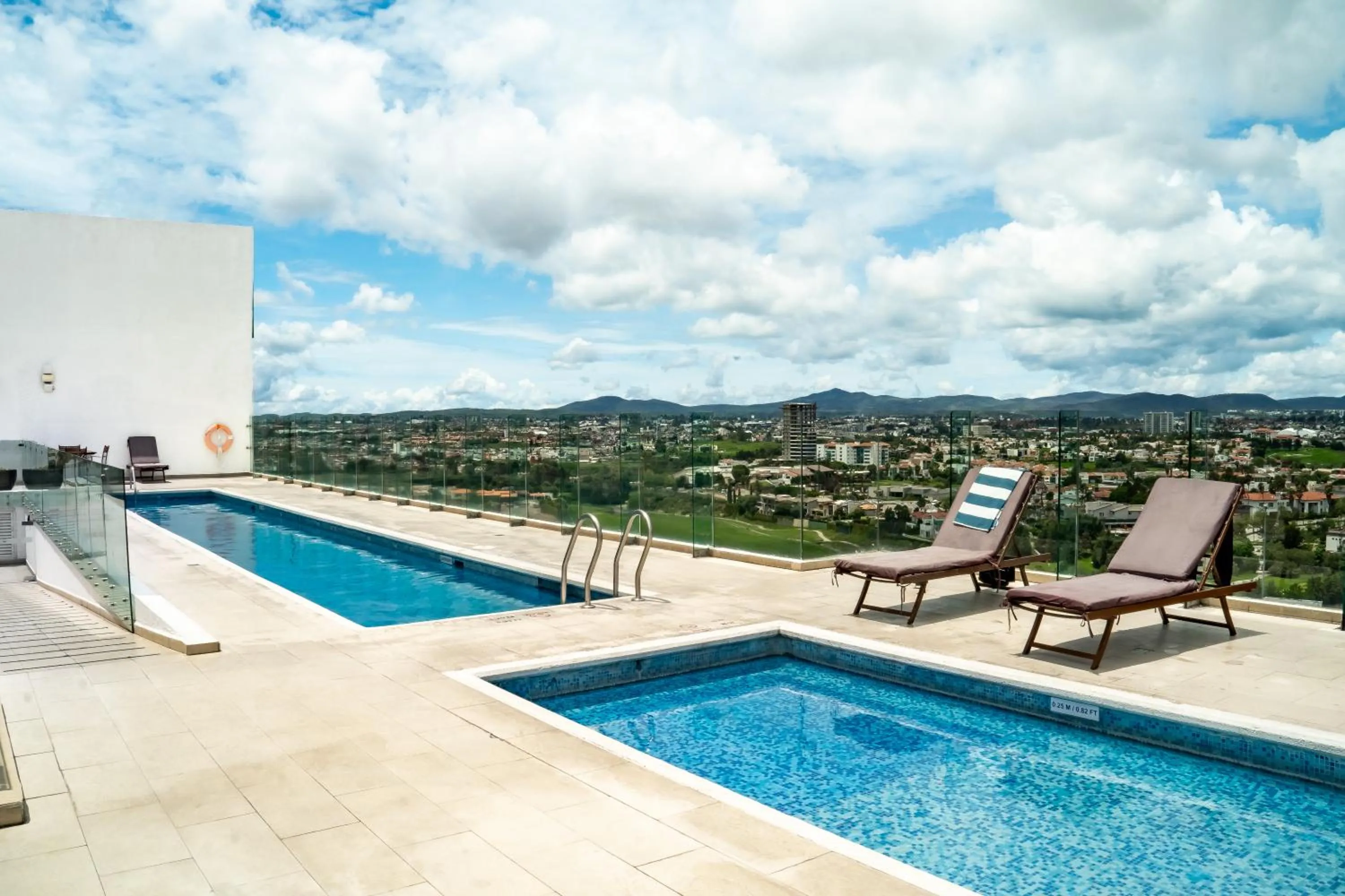 Swimming pool in Holiday Inn Express & Suites Puebla Angelopolis by IHG