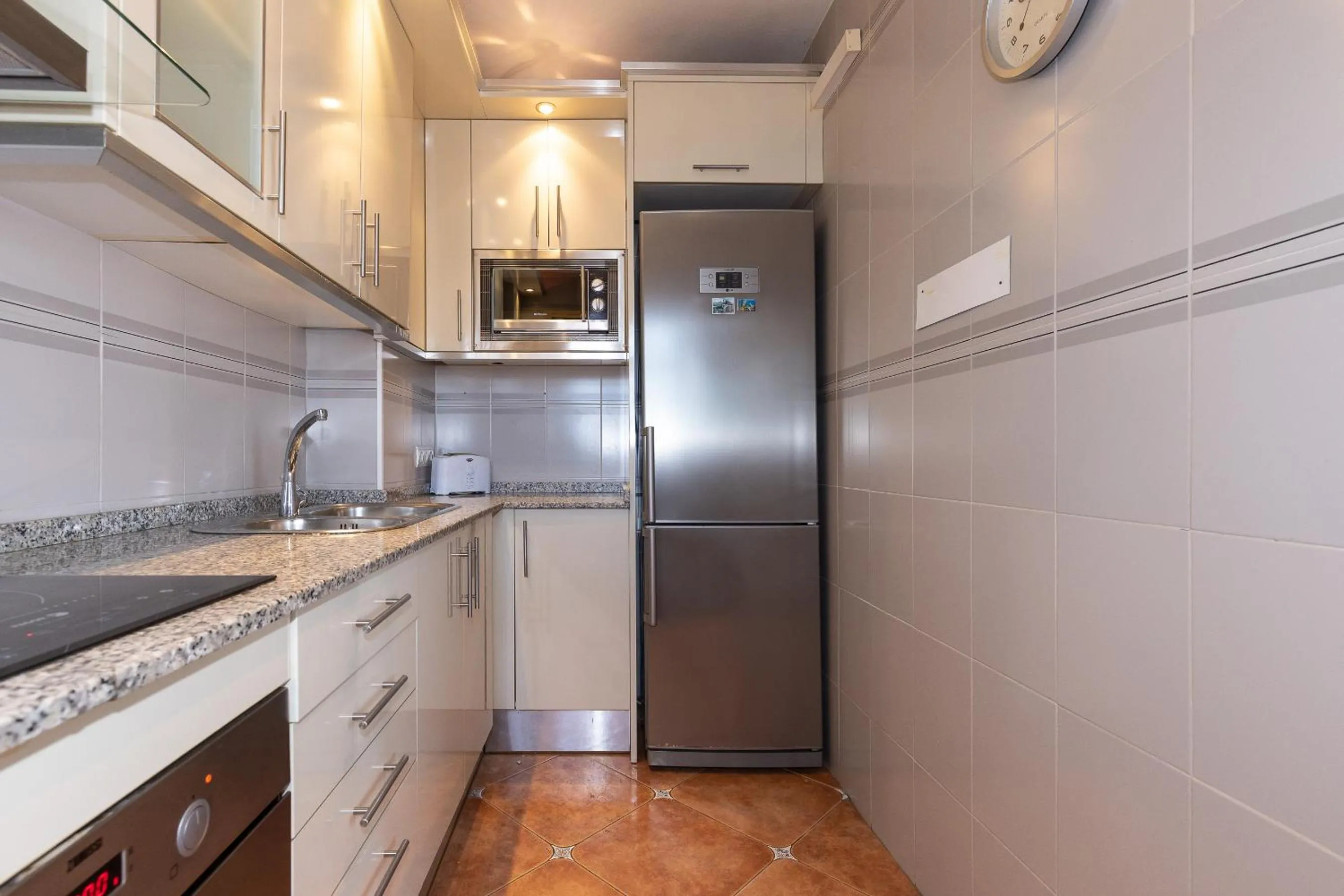 kitchen in Neia Apartment Planet Costa Dorada