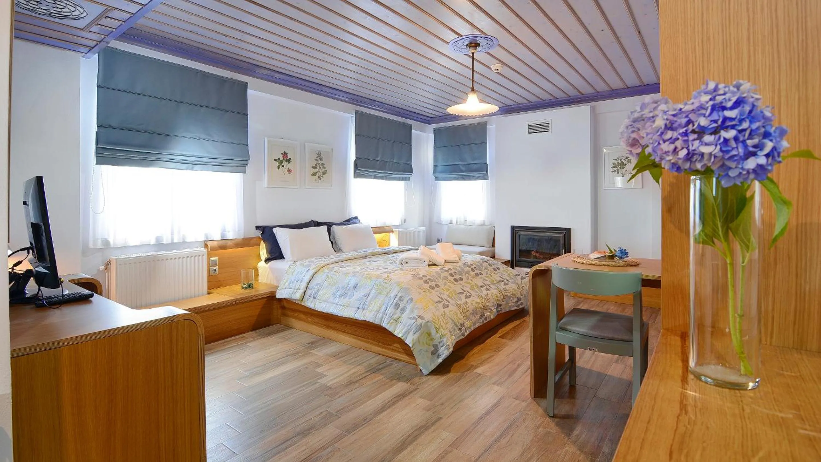 Bed in Dilofo Hotel Luxury Suites