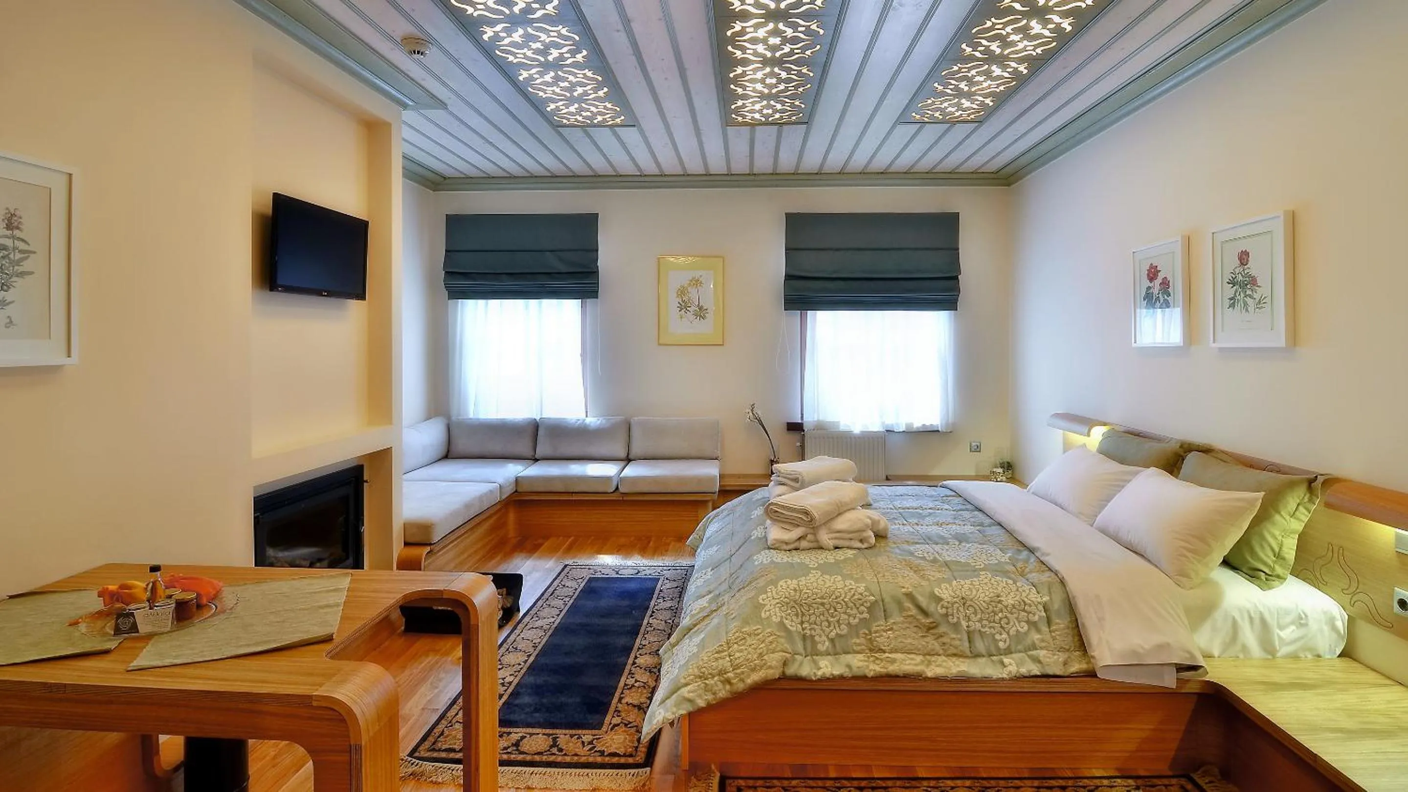 Bed in Dilofo Hotel Luxury Suites