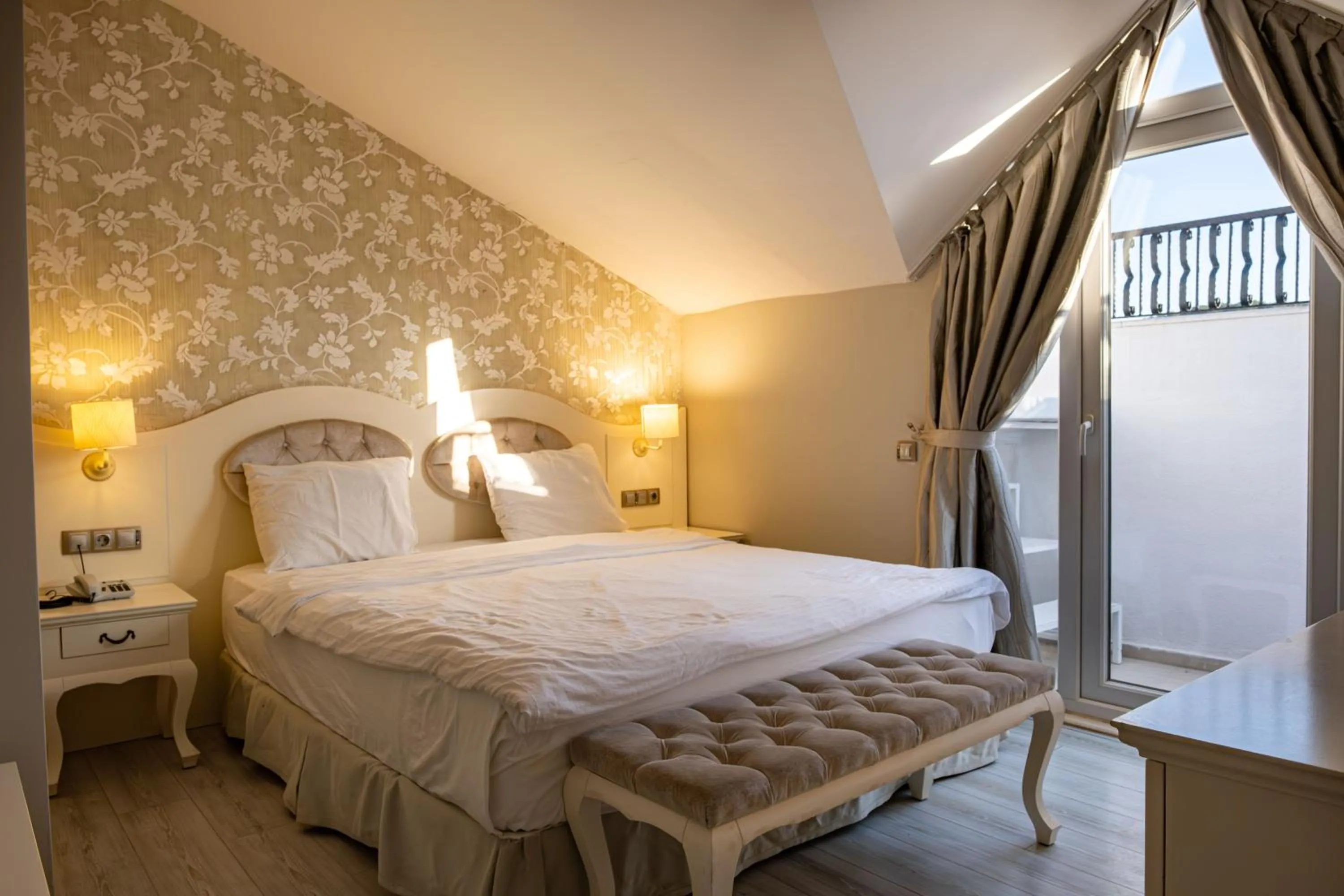 Bed in Pinehill Hotel & Suites