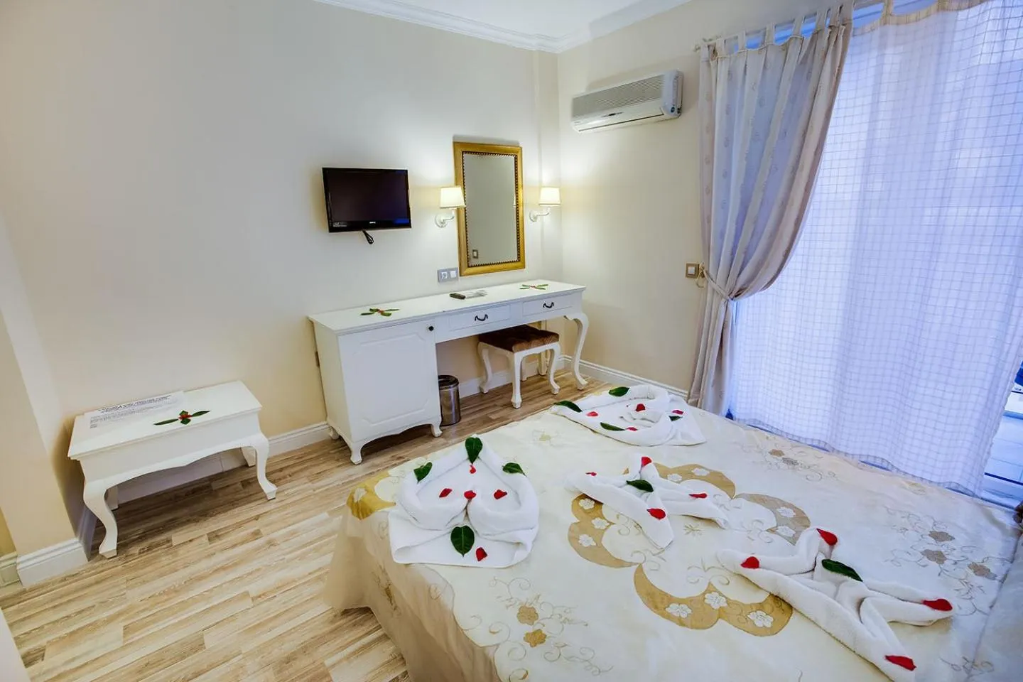 Bed in Pinehill Hotel & Suites