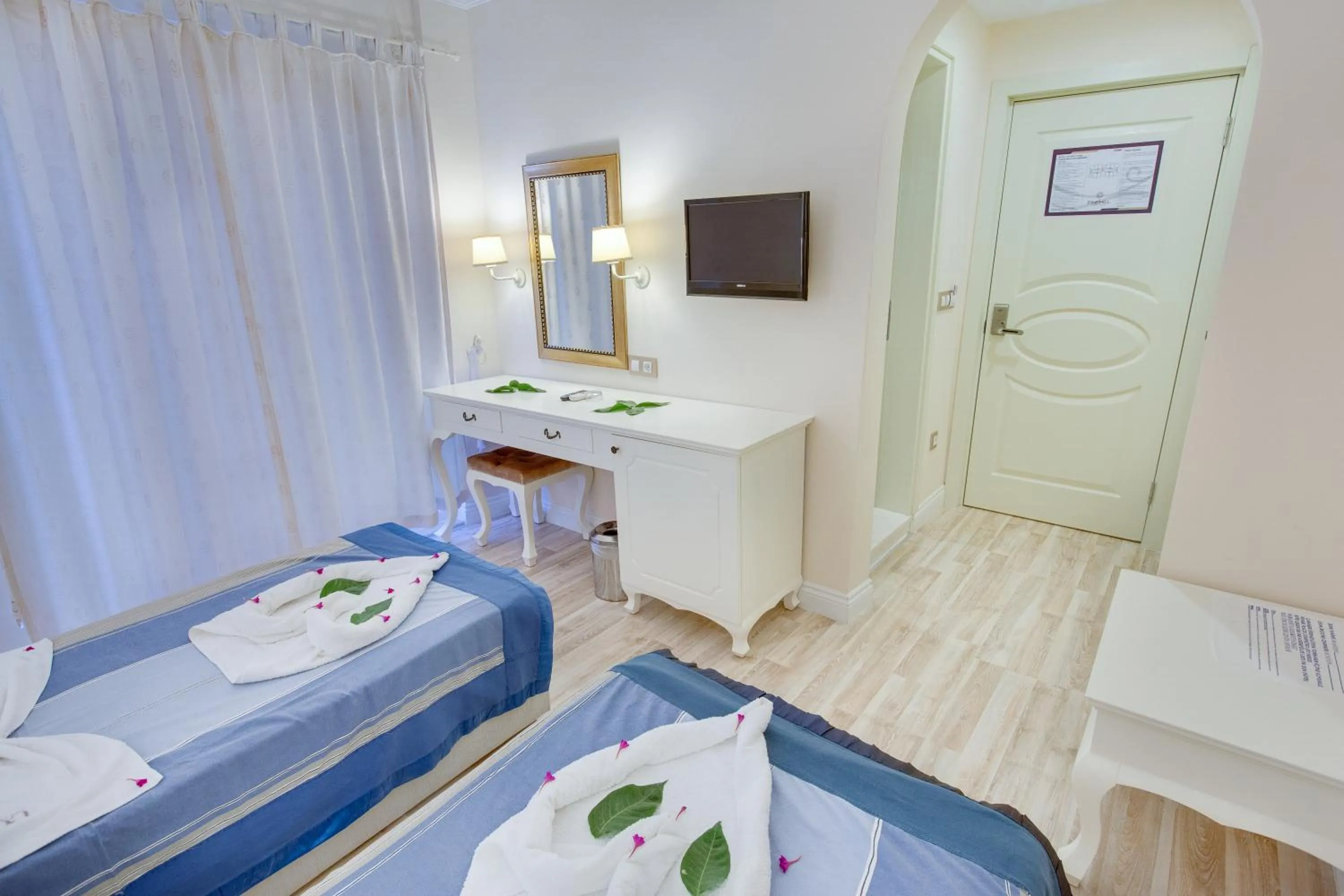 Photo of the whole room, Bed in Pinehill Hotel & Suites