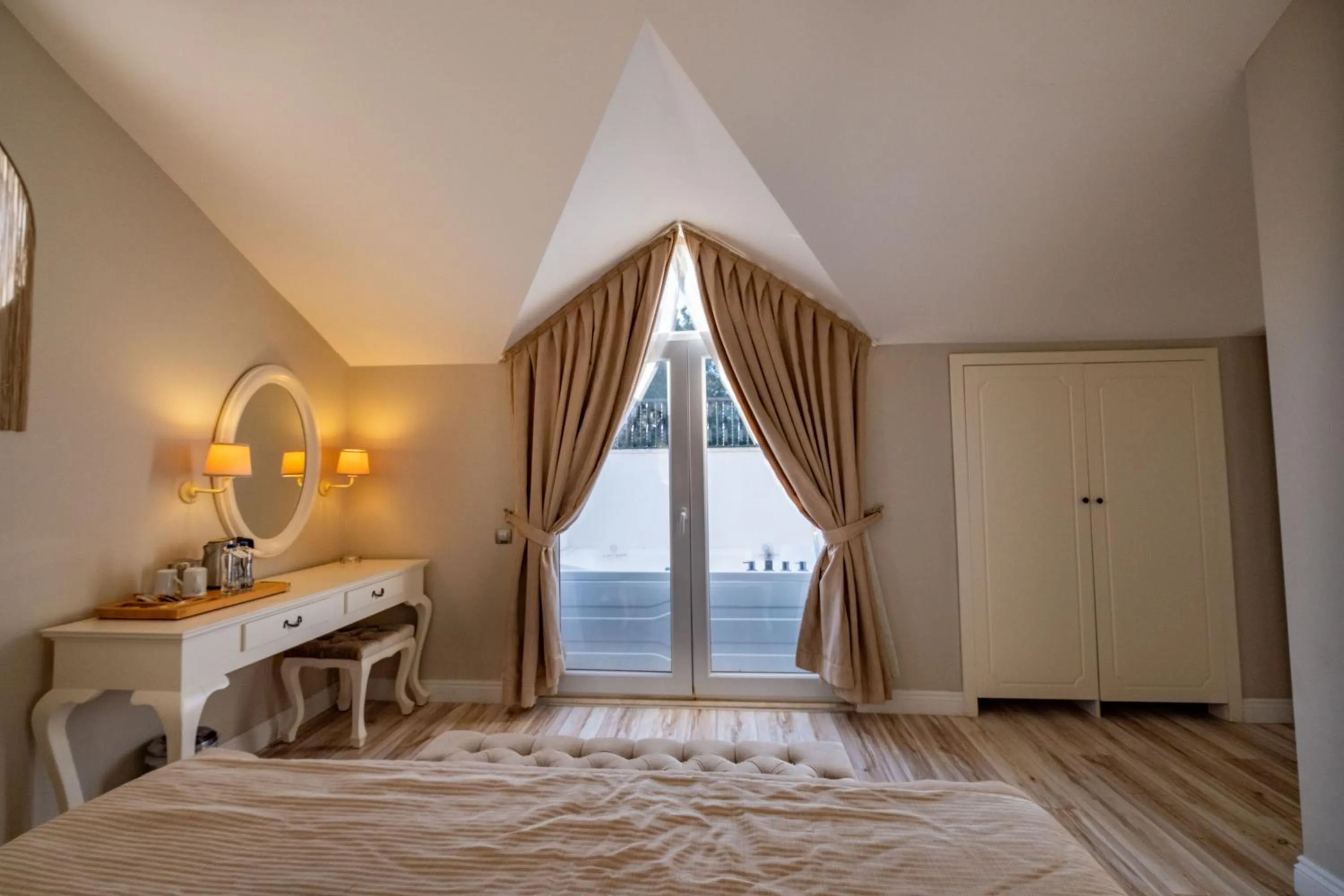 Bed in Pinehill Hotel & Suites