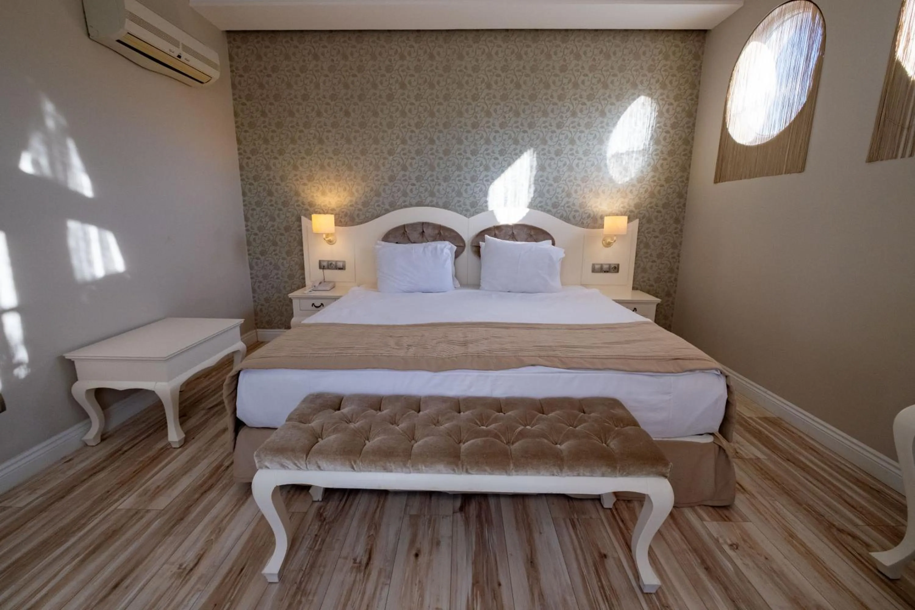 Bed in Pinehill Hotel & Suites